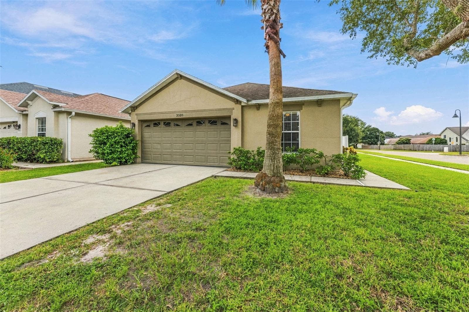 Front - 3320 CARDINAL FEATHER DR, LAND O LAKES