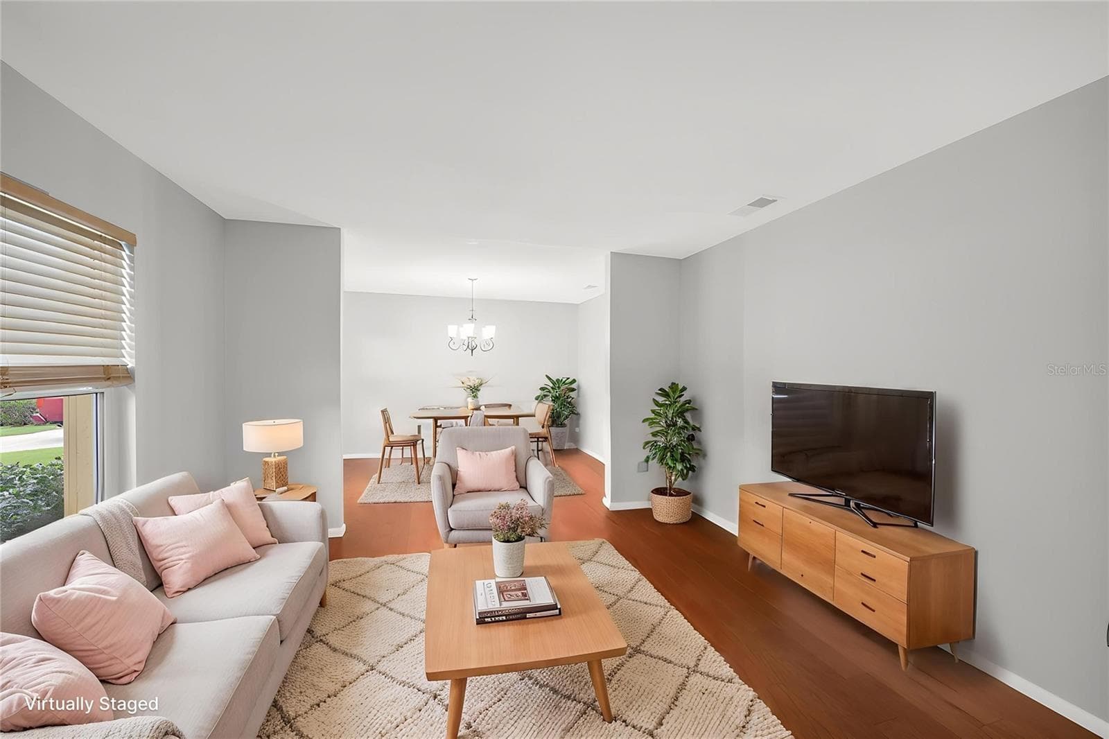 To the left of the foyer is a living room / dining room for effortless entertaining. - 1418 SHELL FLOWER DR, BRANDON