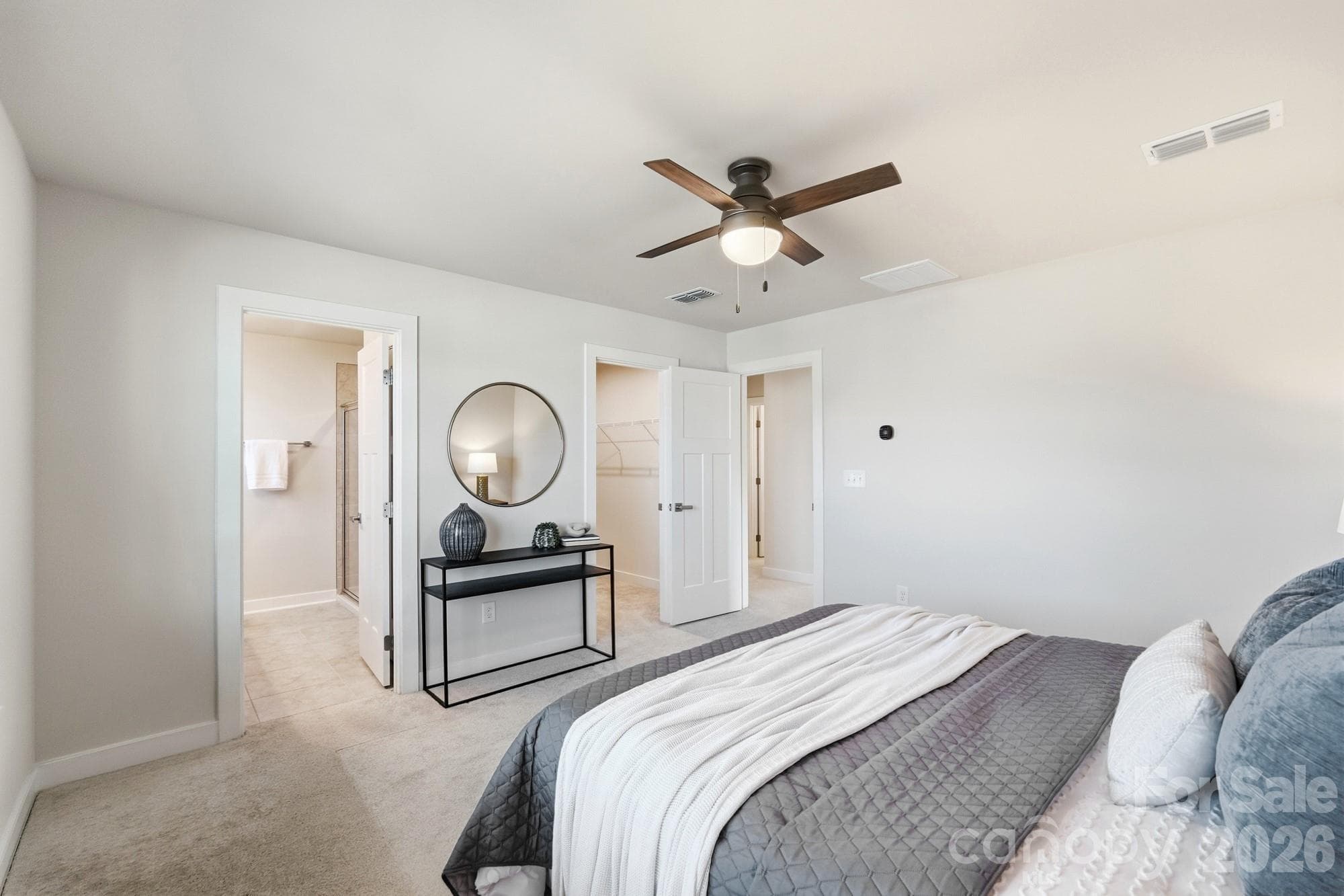 Primary bedroom suite featuring a spacious walk-in closet. - 1857 Giana Lane, Monroe