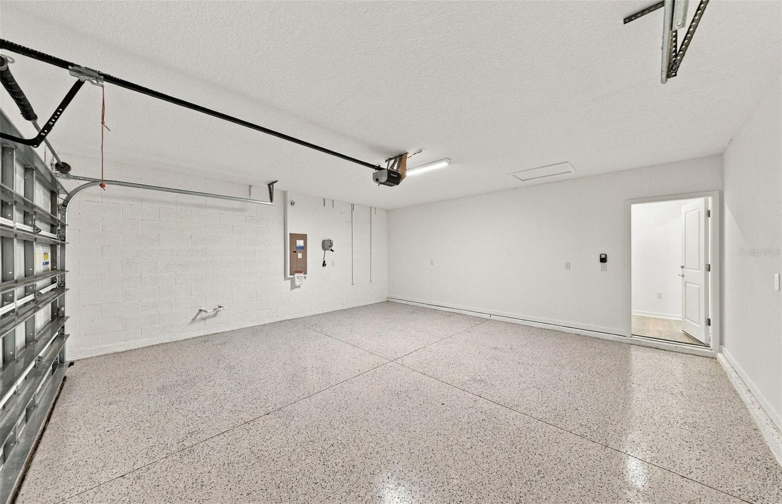 2-Car Garage w/Epoxy Flooring - 9185 NEWMONS PL, WILDWOOD