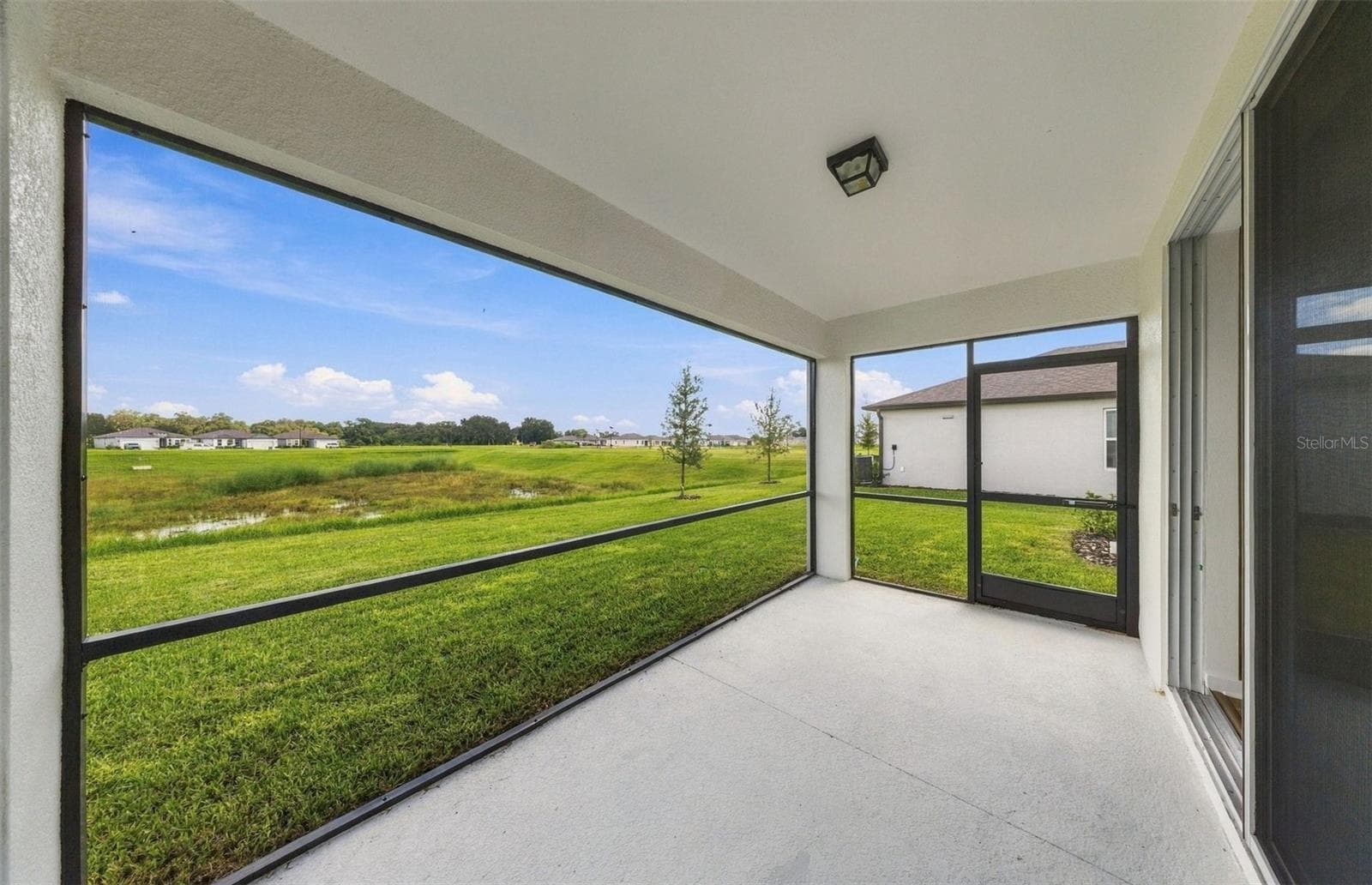 Covered Lanai w/Screen Enclsosure - 9185 NEWMONS PL, WILDWOOD