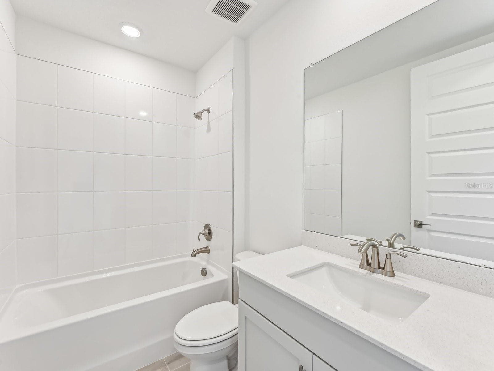 Photo is not of the actual home, but is an inspirational photo of builder’s model home and may depict options, furnishings, and/or decorator features that are not included - 99 TEQUESTA CT, PALM COAST