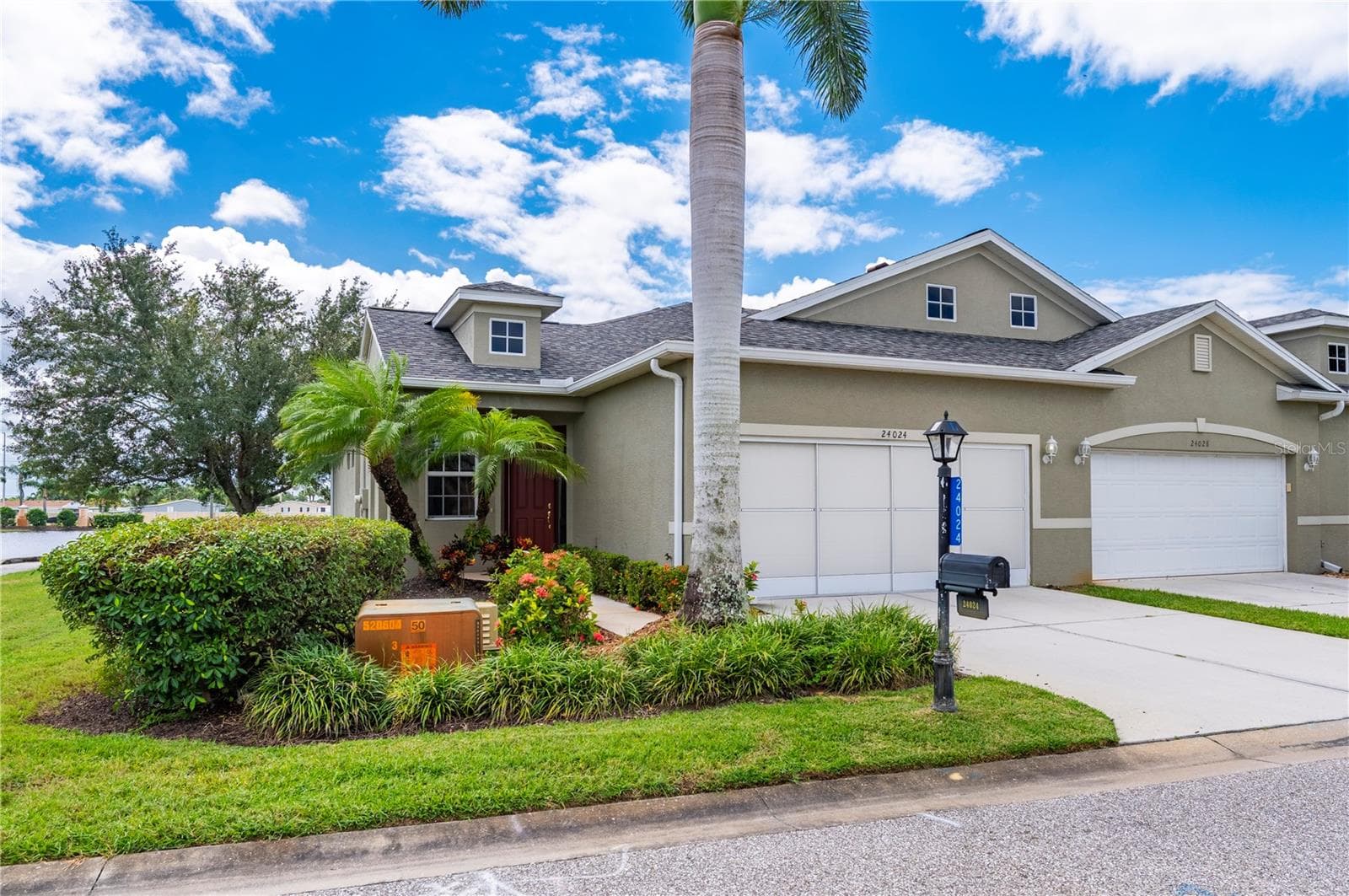 Wide side yard by golf cart path - 24024 BUCKINGHAM WAY, PORT CHARLOTTE
