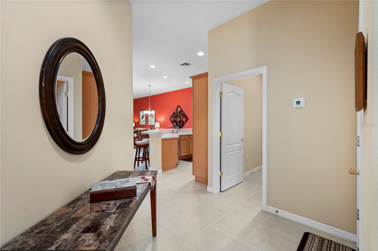 Hallway to kitchen and living area - 24024 BUCKINGHAM WAY, PORT CHARLOTTE