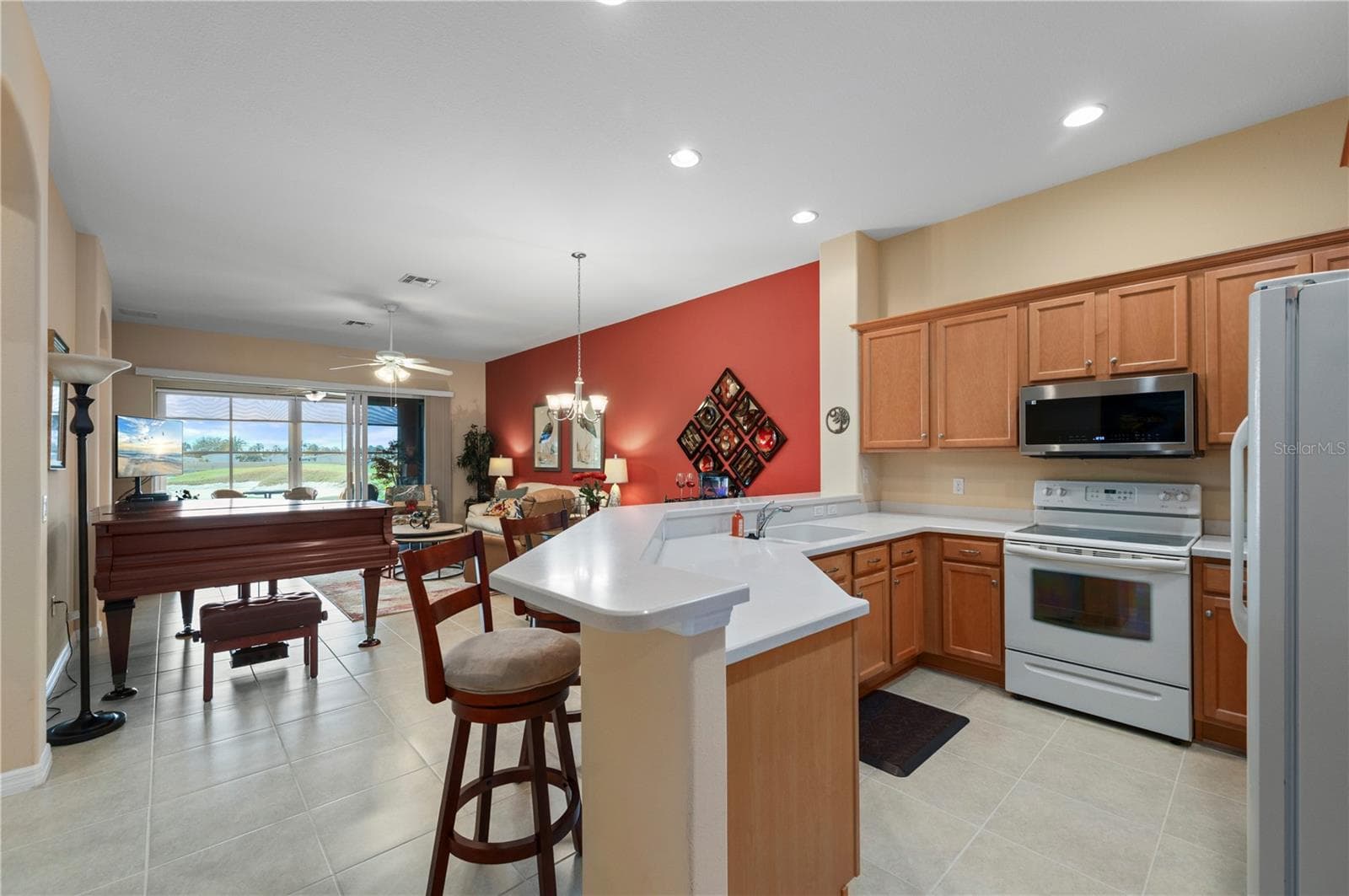 Kitchen is open to living room and dining - 24024 BUCKINGHAM WAY, PORT CHARLOTTE
