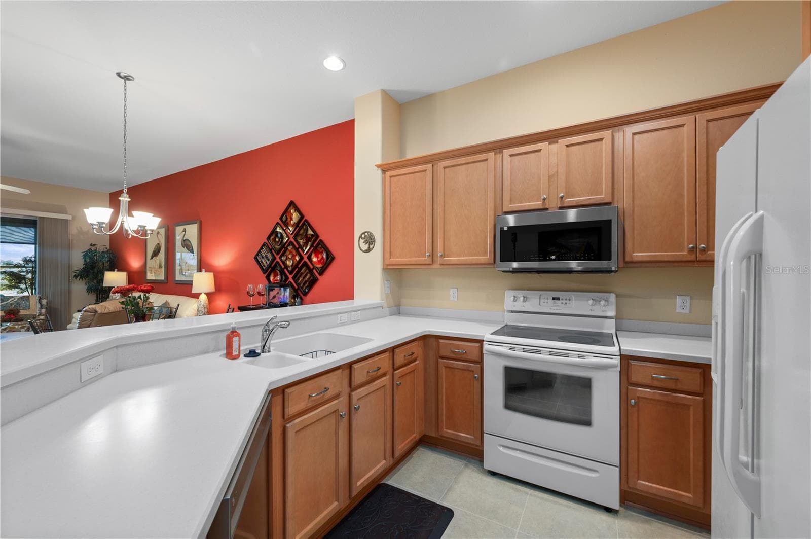 Corian Counters, wood cabinets - 24024 BUCKINGHAM WAY, PORT CHARLOTTE