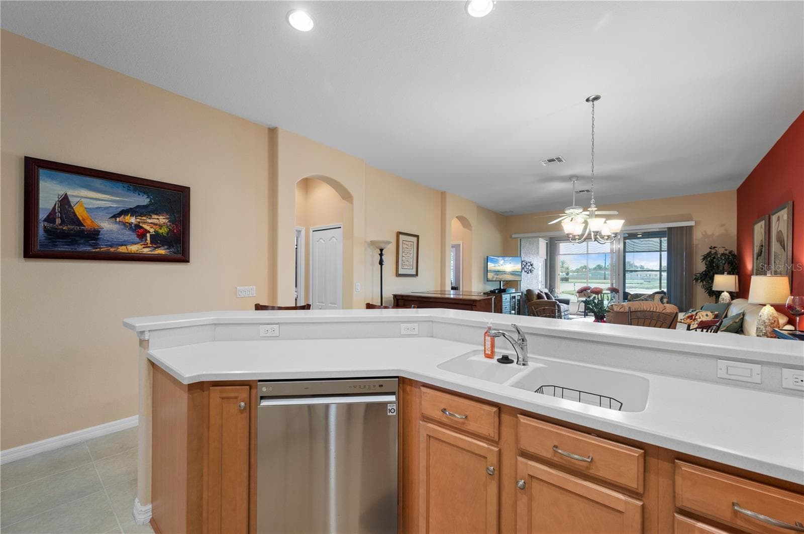 Golf course and water views from the kitchen - 24024 BUCKINGHAM WAY, PORT CHARLOTTE