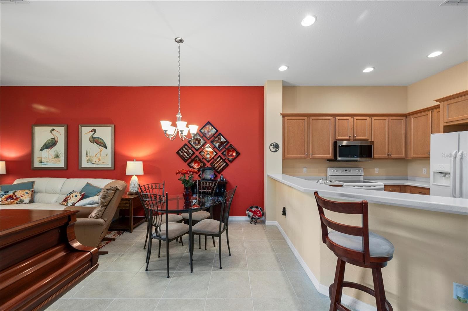 Dining area with accent wall - 24024 BUCKINGHAM WAY, PORT CHARLOTTE