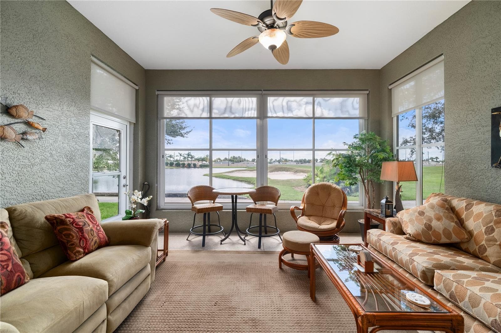 Lanai is enclosed with Acrilic wind-rated tinted windows - 24024 BUCKINGHAM WAY, PORT CHARLOTTE