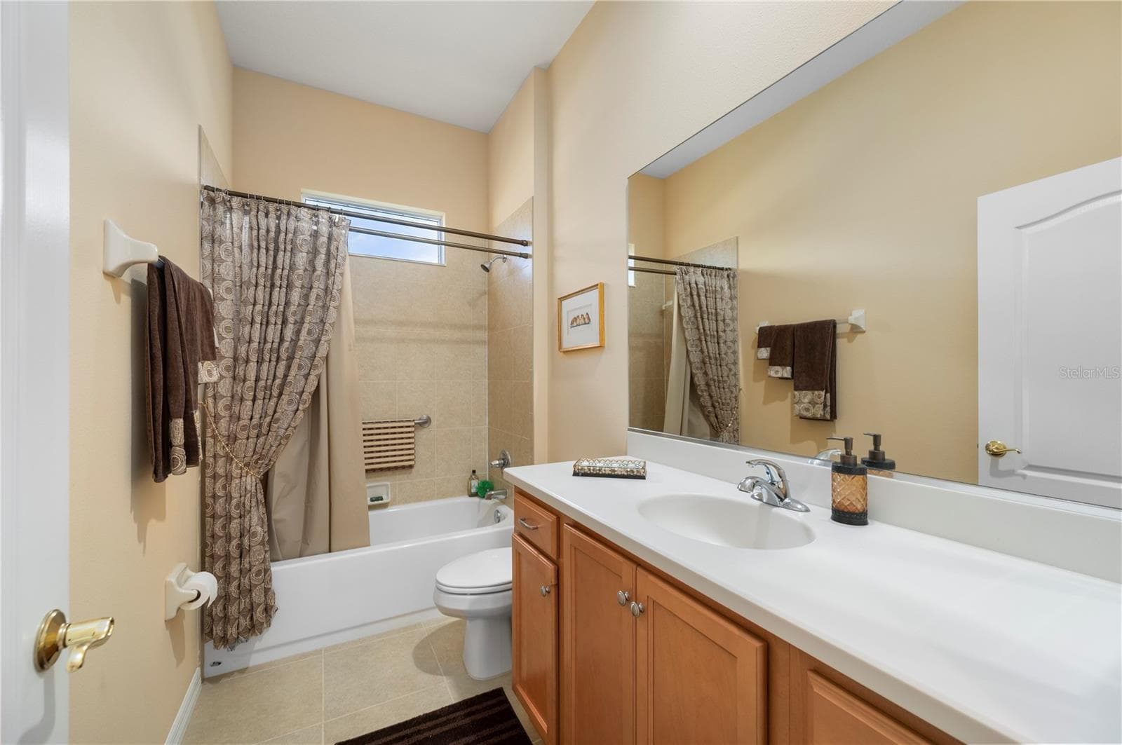 Guest bath with tub/shower combo - 24024 BUCKINGHAM WAY, PORT CHARLOTTE