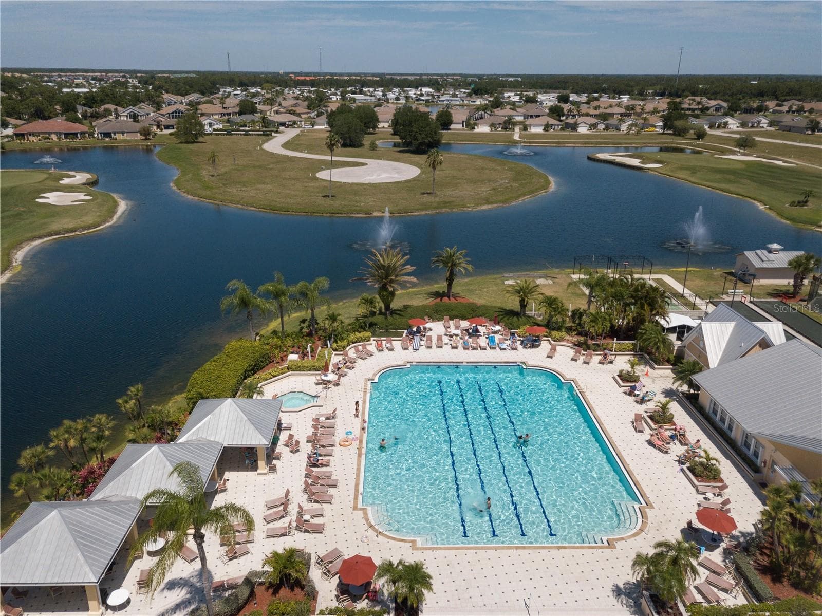Lakes surrounding the pool area - 24024 BUCKINGHAM WAY, PORT CHARLOTTE