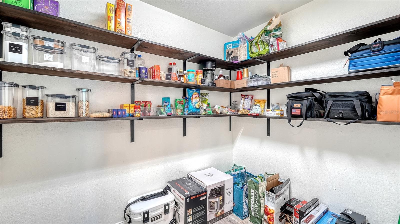 Walk-in Pantry with custom built-in shelving - 16121 59TH CT E, PARRISH