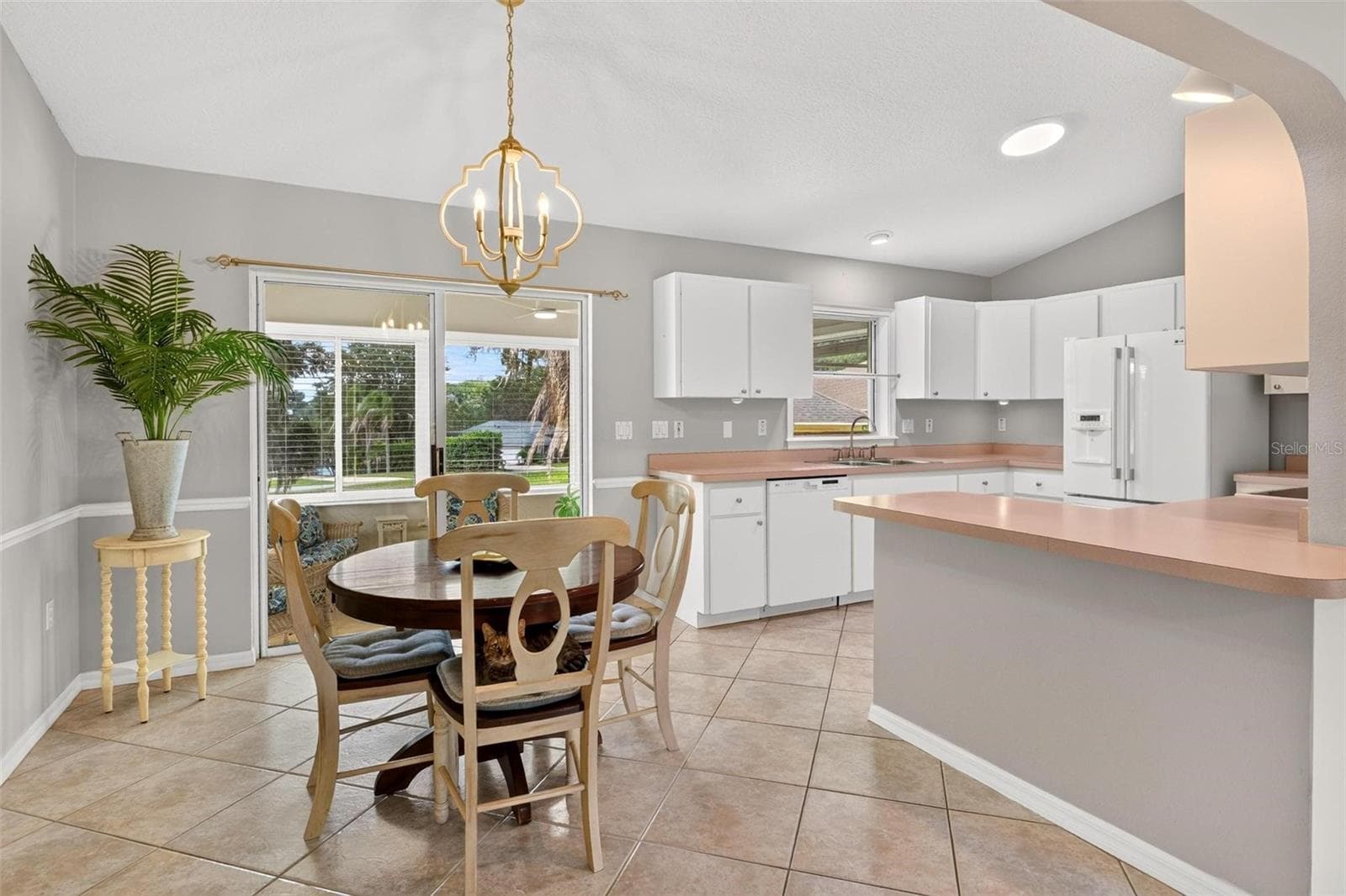 Dining room/Kitchen - 211 HANGING MOSS LN, LADY LAKE