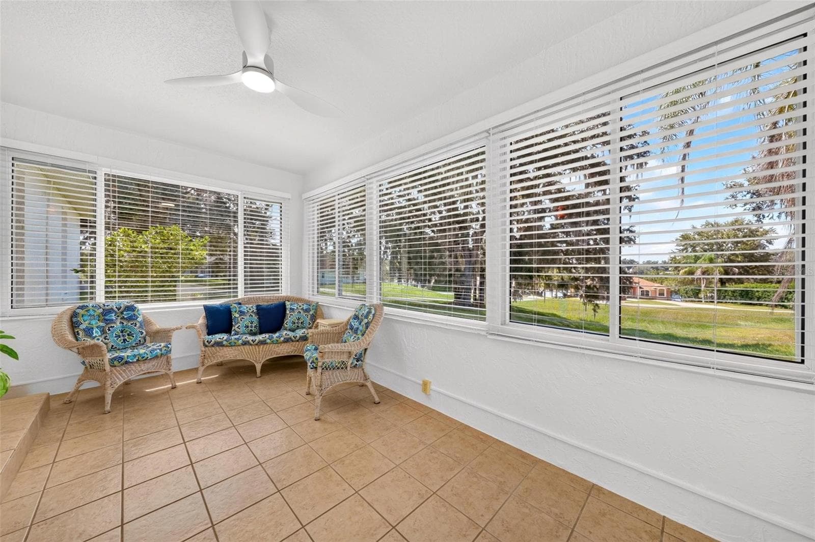 Patio inside - 211 HANGING MOSS LN, LADY LAKE