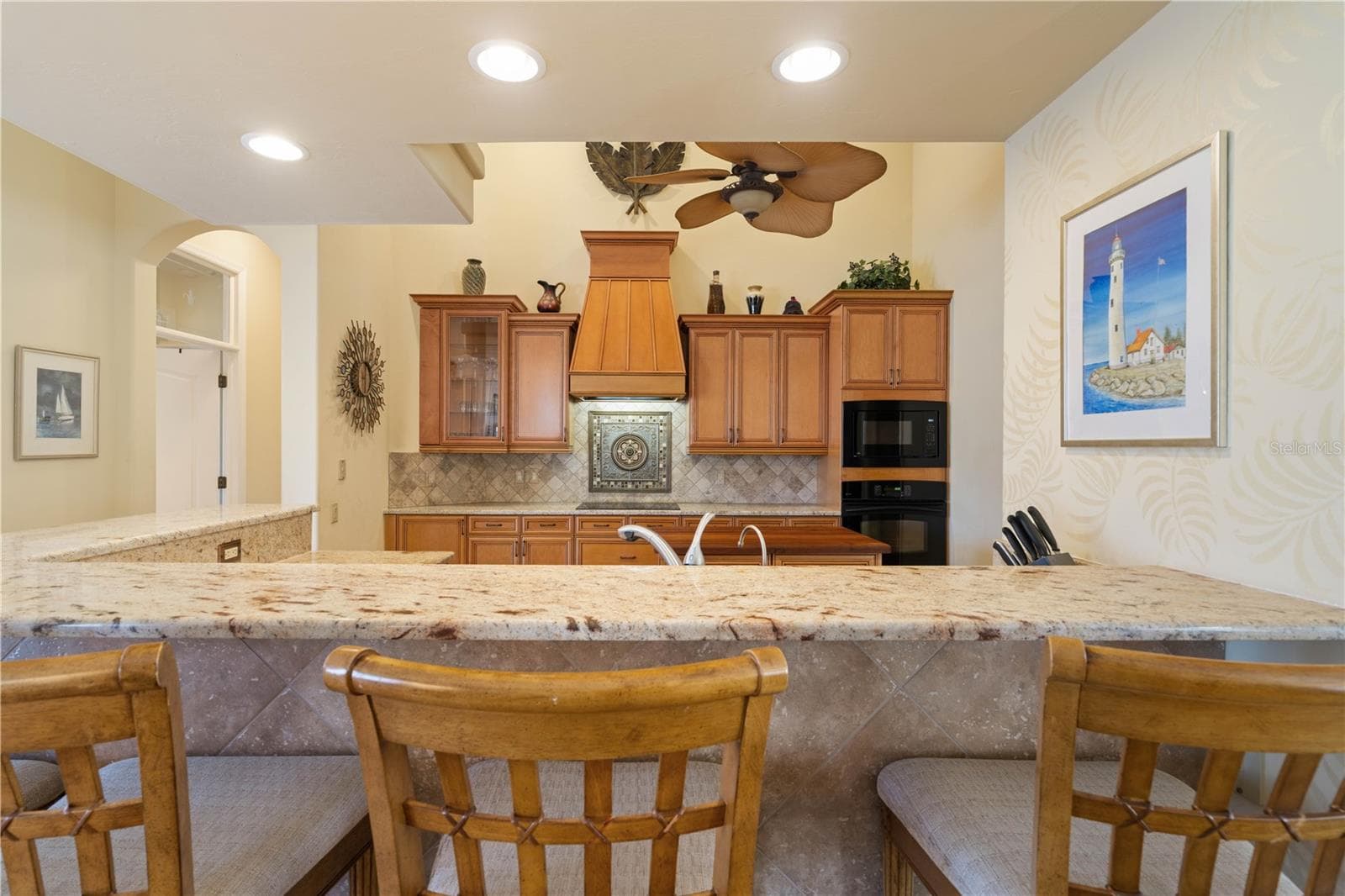 Kitchen and breakfast bar - 1448 KIWI CT, PUNTA GORDA