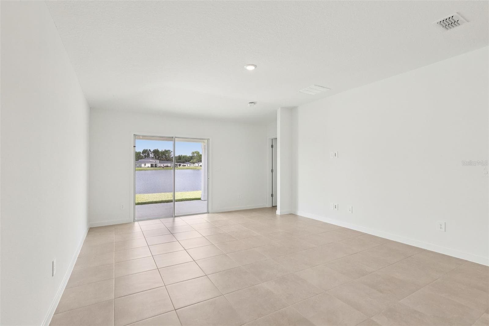 Photo is not of the actual home, but is an inspirational photo of builder’s model home and may depict options, furnishings, and/or decorator features that are not included - 126 WANDERING CREEK WAY, PALM COAST