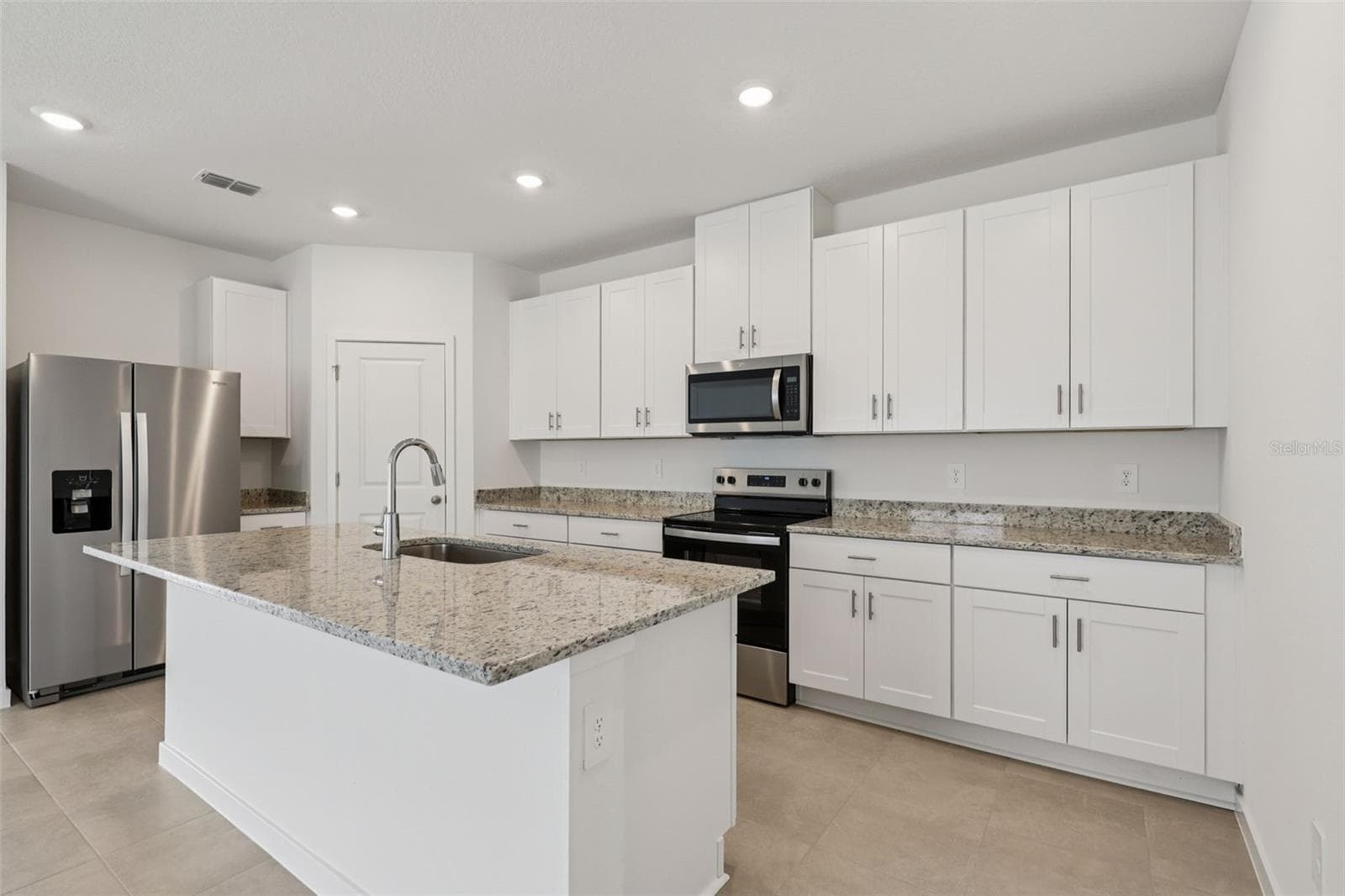 Photo is not of the actual home, but is an inspirational photo of builder’s model home and may depict options, furnishings, and/or decorator features that are not included - 126 WANDERING CREEK WAY, PALM COAST