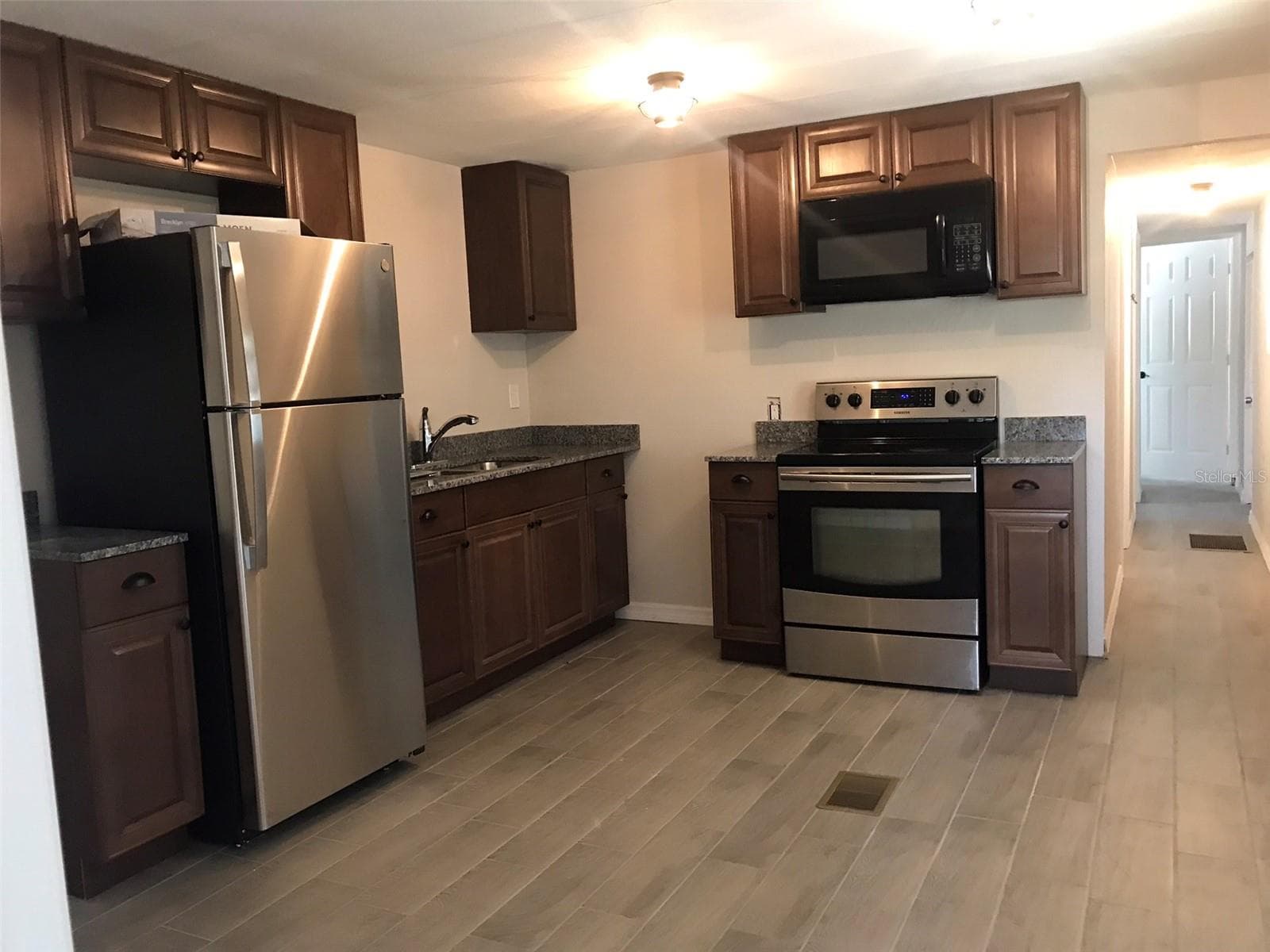 Single Family Residence at 7037 LOFTY DR, PORT RICHEY, photo 2 of 5