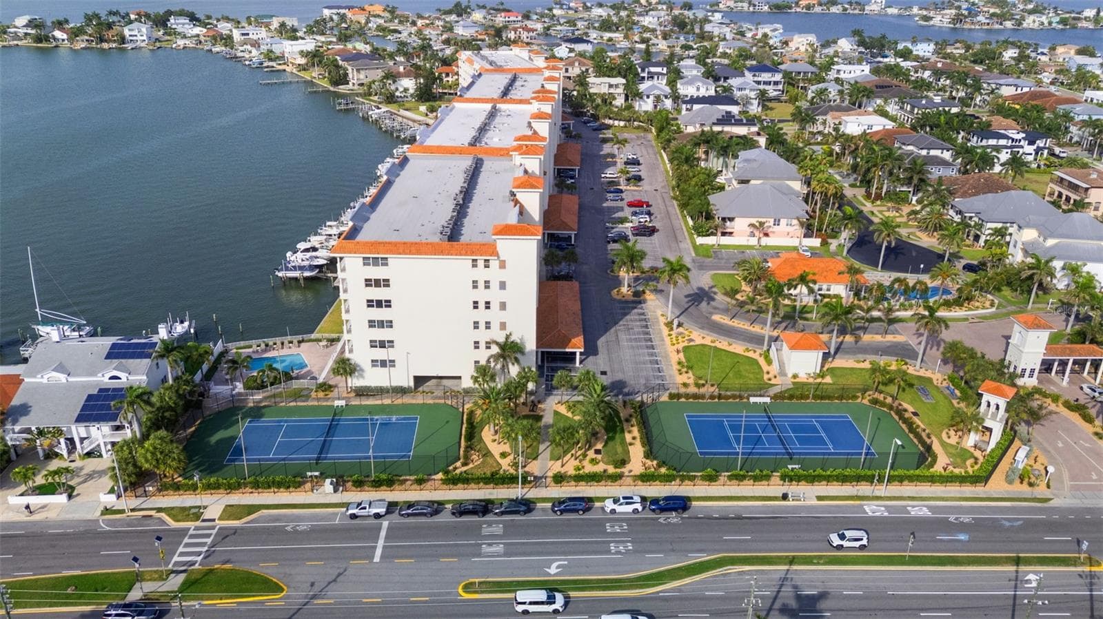 East facing view of the community shows from the entry to tennis courts lovely Pool amenities Dock community center in abundance of parking within RSYTC’s gates - 17717 GULF BLVD #604, REDINGTON SHORES