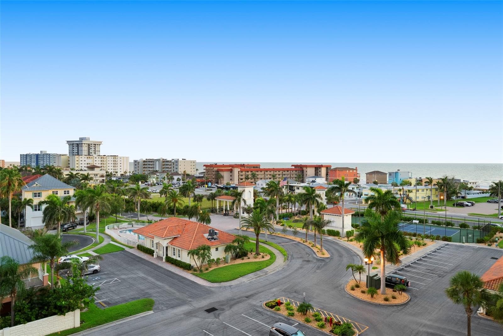 Aerial view facing Golf Boulevard of our gorgeous clubhouse, front entry and parking - 17717 GULF BLVD #604, REDINGTON SHORES