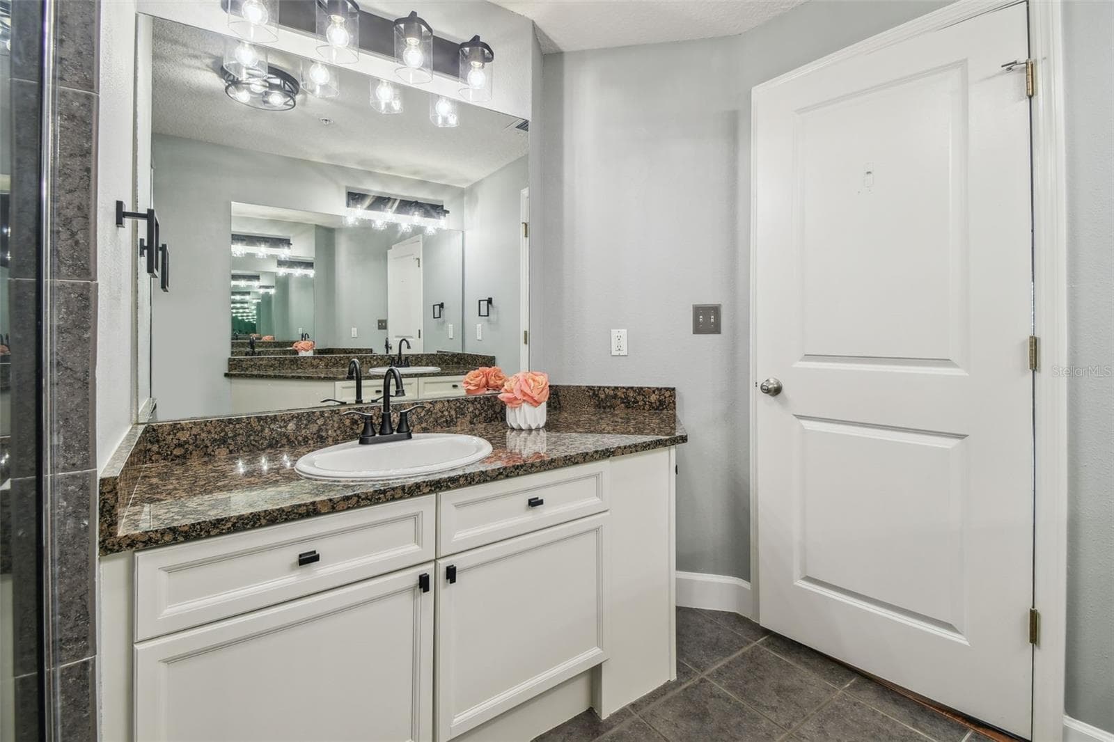 Primary bathroom with dual vanities. - 435 S OREGON AVE #304, TAMPA