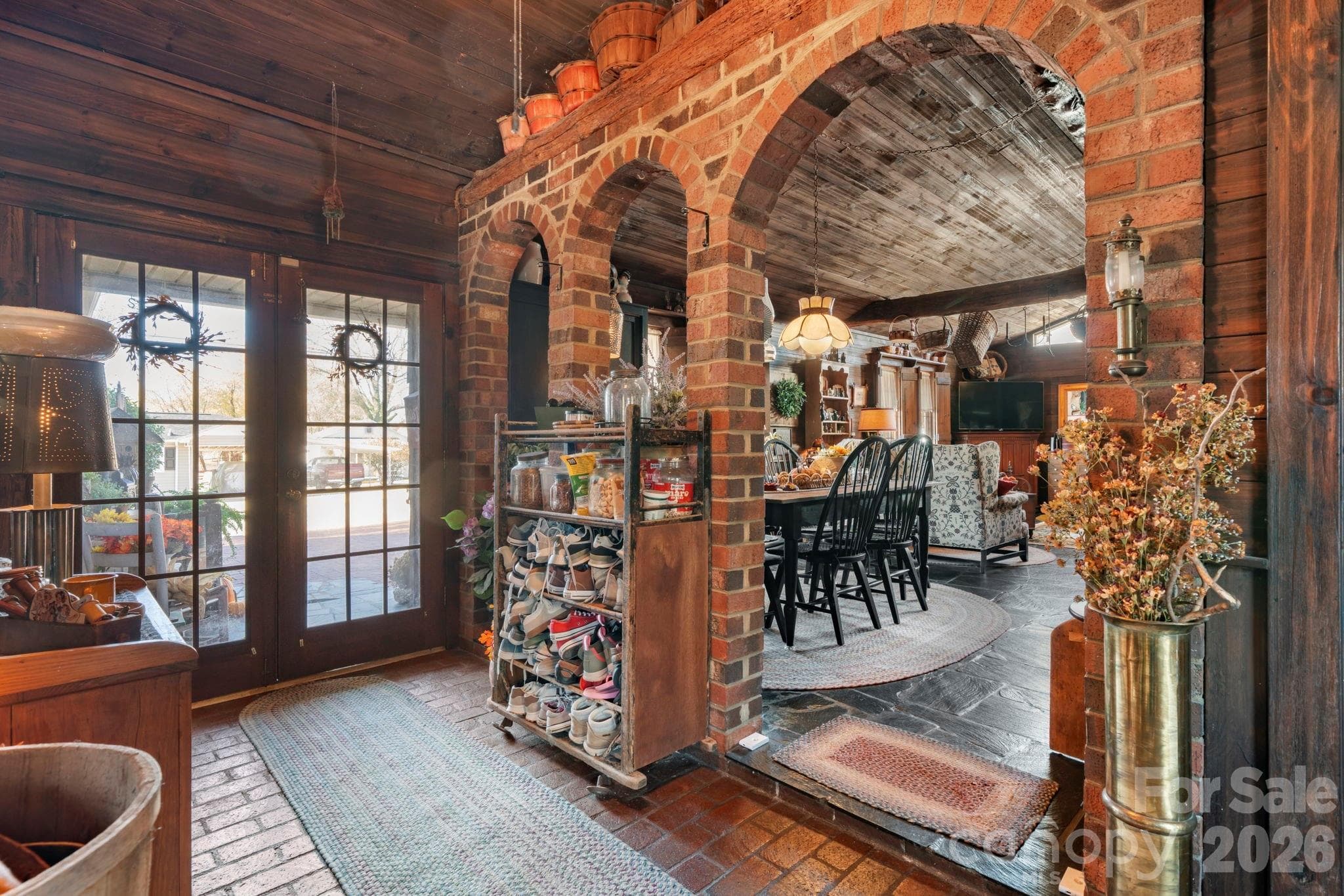 brick arches frame the entryway into the large flex space - 901 Union Street, Maiden