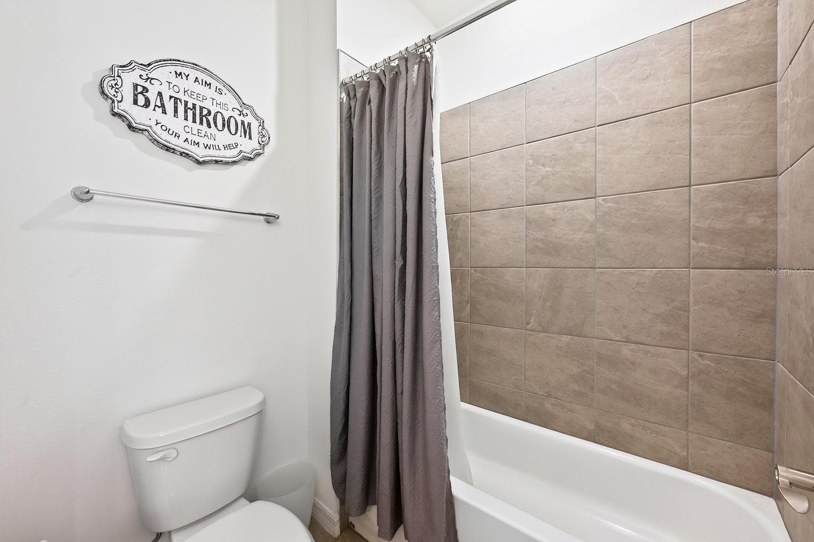 Bathroom 2 features dual vanities and a tub with shower. - 33384 COUNTRY HOUSE DR, SORRENTO