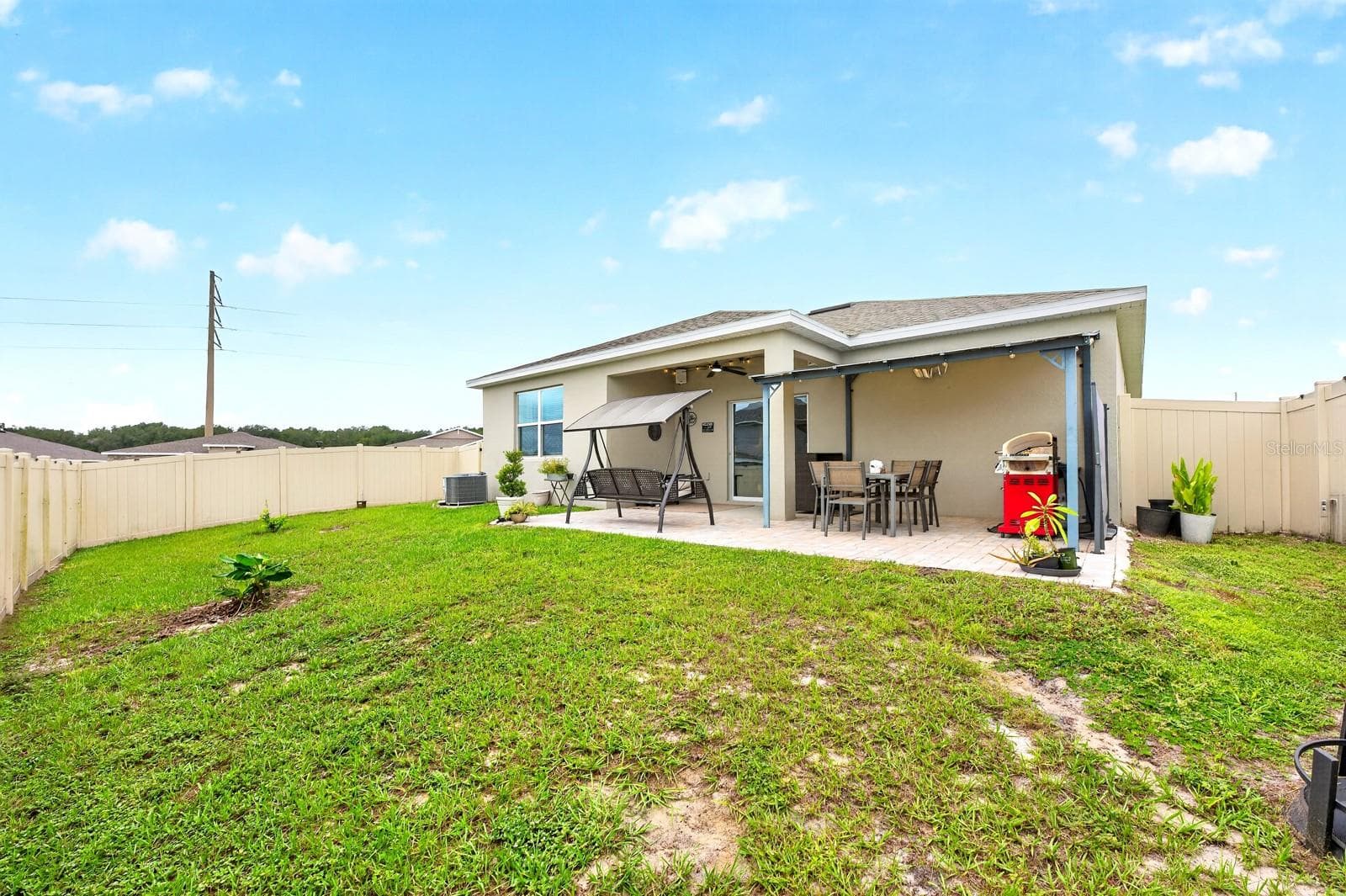 The back of the home. - 33384 COUNTRY HOUSE DR, SORRENTO