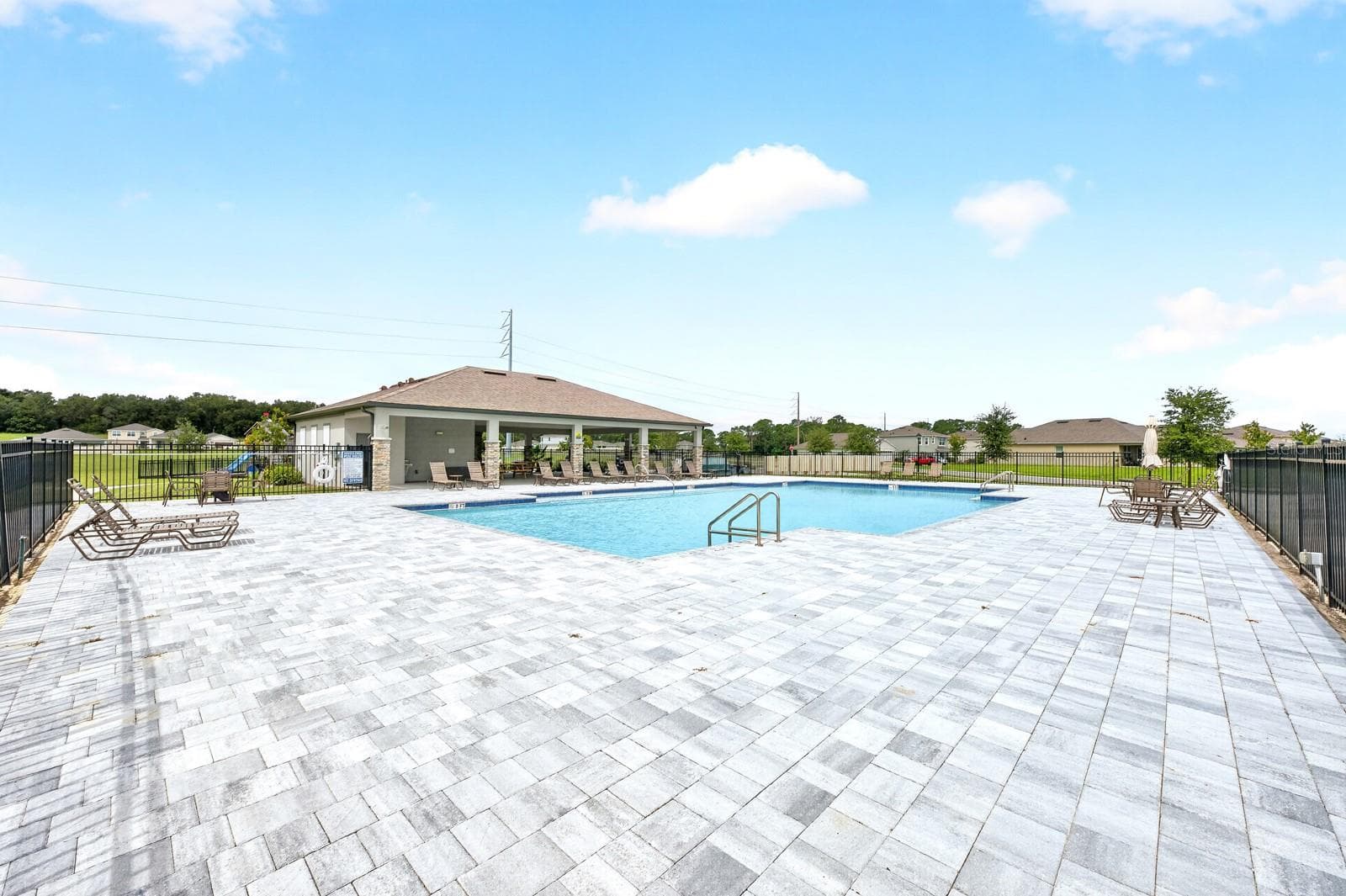 The LOW HOA provides access to a sparkling community pool, clubhouse and playground. - 33384 COUNTRY HOUSE DR, SORRENTO