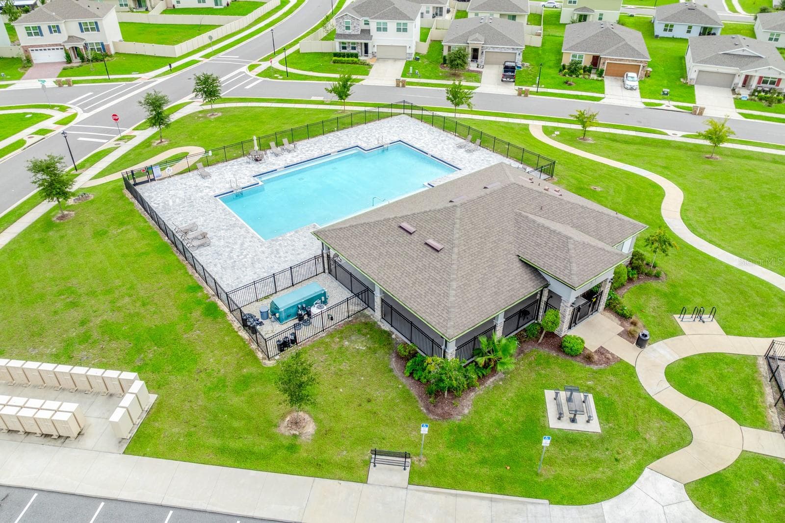 Aerial view of the Clubhouse and pool. - 33384 COUNTRY HOUSE DR, SORRENTO