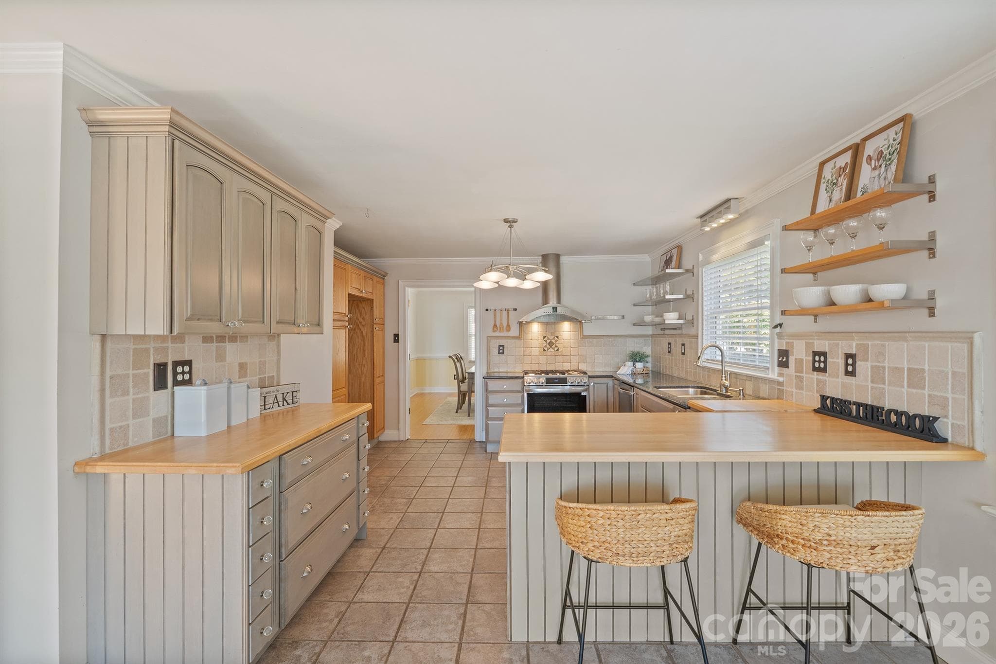 Countertops are a mix of butcher block and granite - 20919 Island Forest Drive, Cornelius