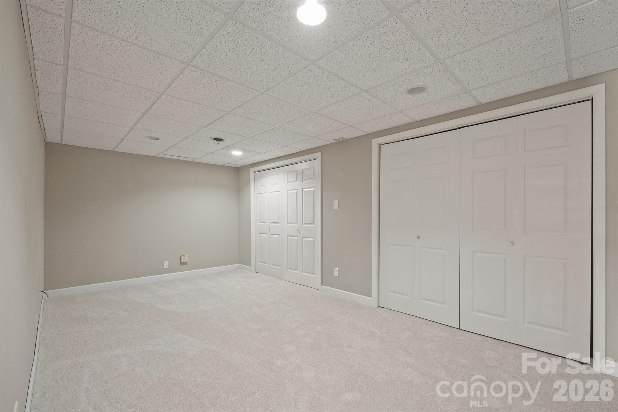 Flex room behind stairway to basement can be additional sleeping quarters or that pefect movie room or game room - 20919 Island Forest Drive, Cornelius