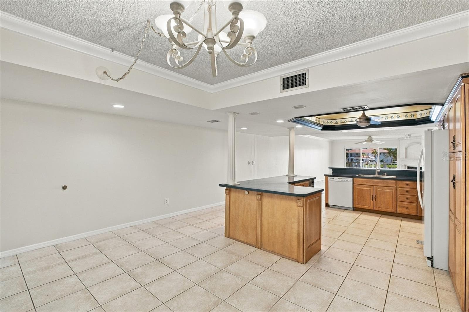 Virtually staged Balcony view from living room - 544 PINELLAS BAYWAY S #F8, TIERRA VERDE