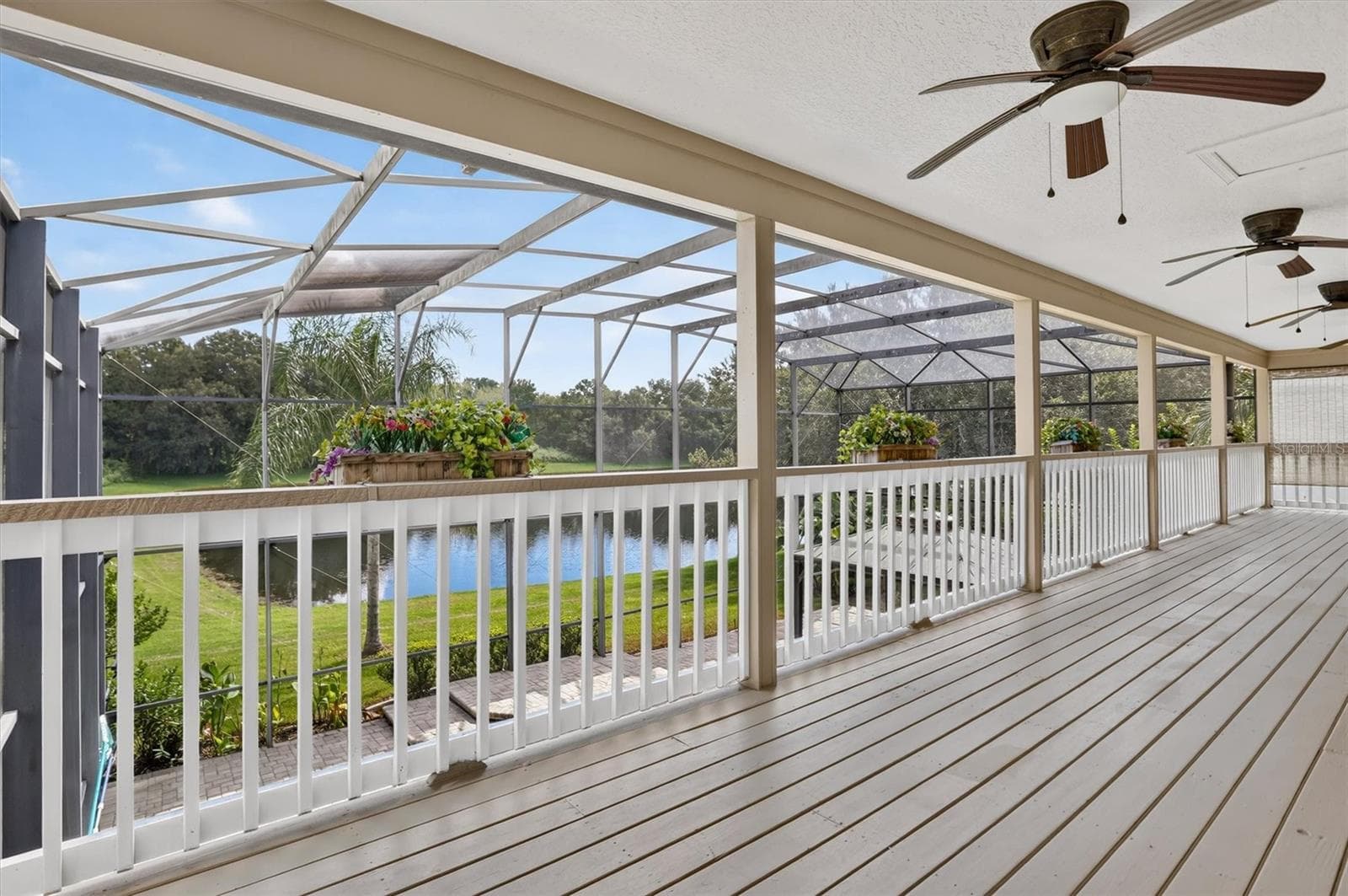 Upper balcony overlooking the screened pool area. - 2109 WEMBLEY PL, OVIEDO