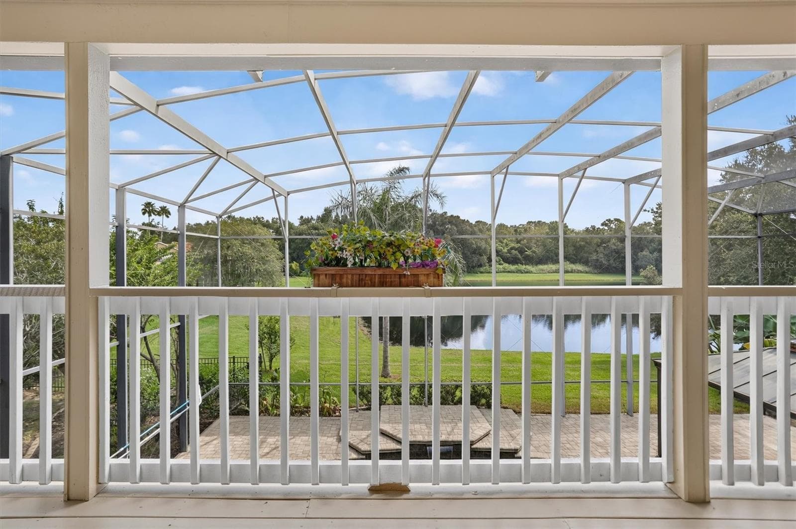 Upper balcony overlooking the screened pool area. - 2109 WEMBLEY PL, OVIEDO
