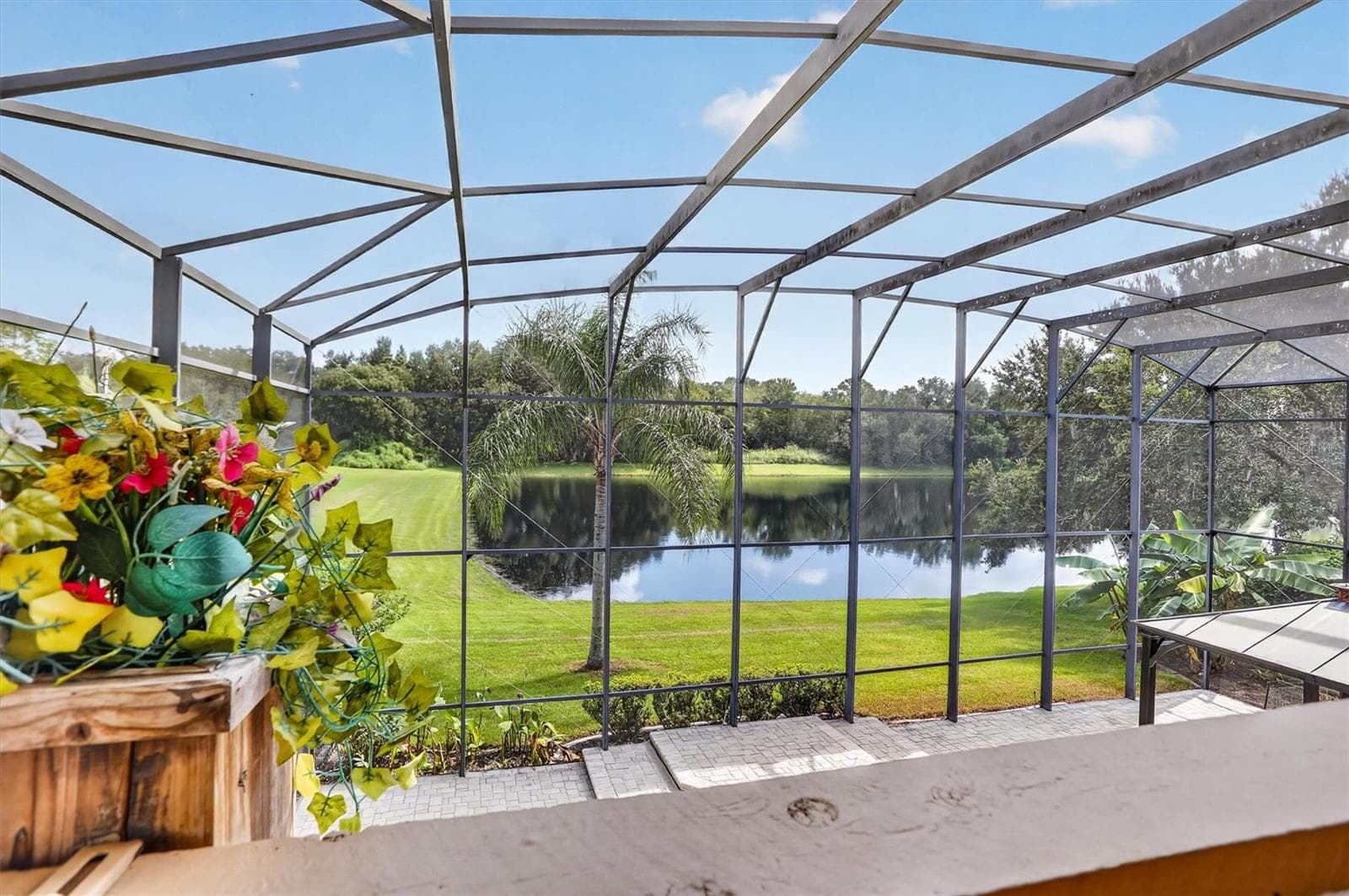 Upper balcony overlooking the screened pool area. - 2109 WEMBLEY PL, OVIEDO