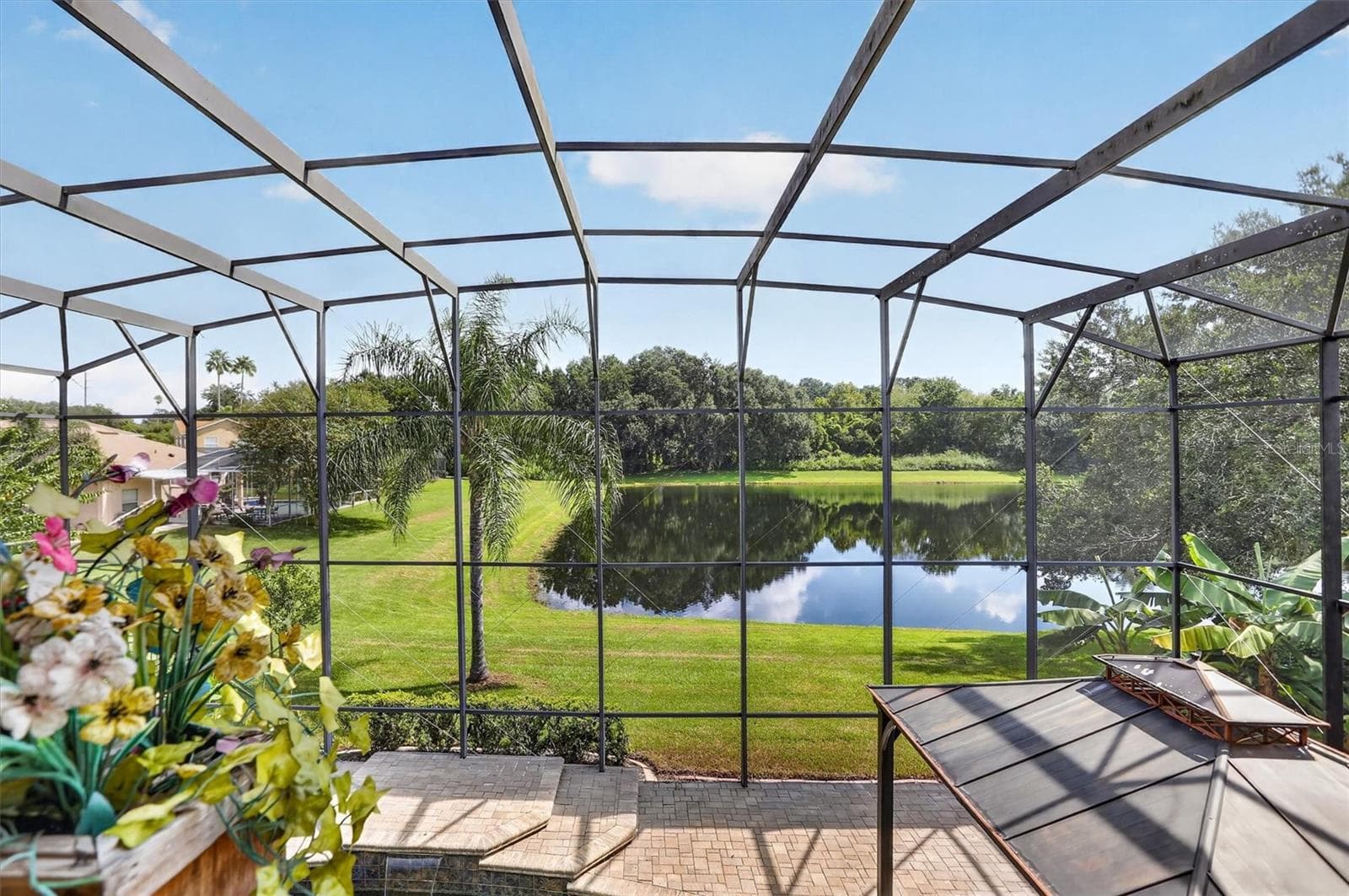 Upper balcony overlooking the screened pool area. - 2109 WEMBLEY PL, OVIEDO