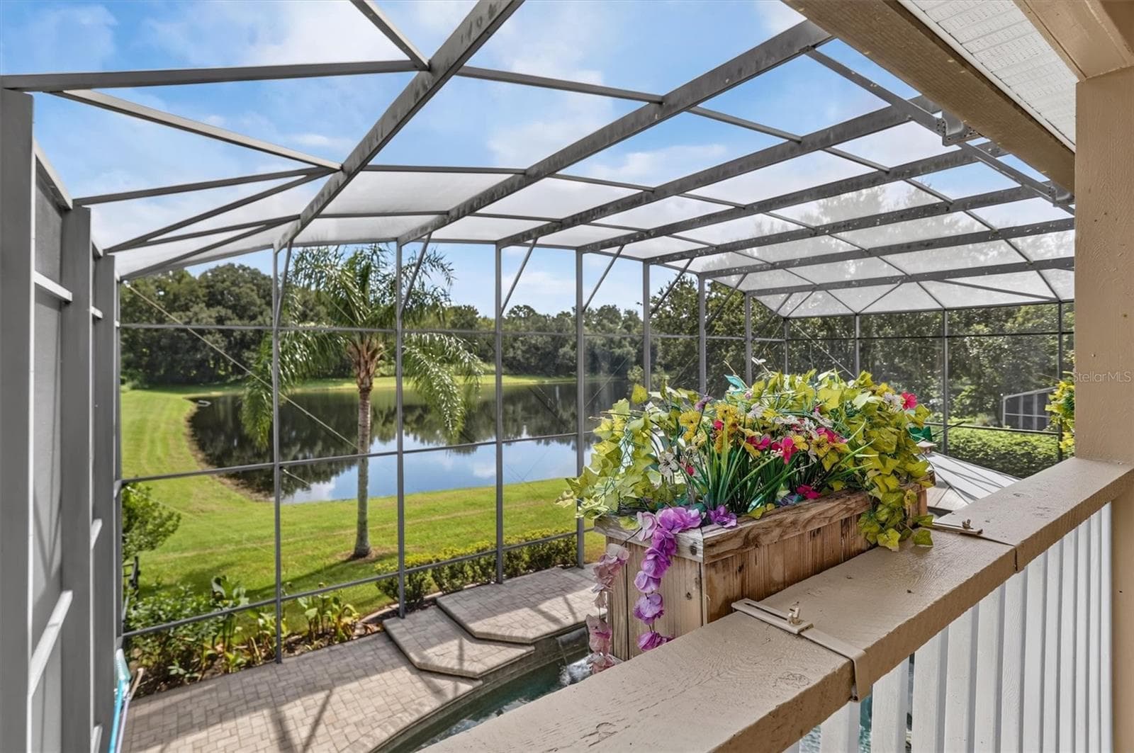 Upper balcony overlooking the screened pool area. - 2109 WEMBLEY PL, OVIEDO