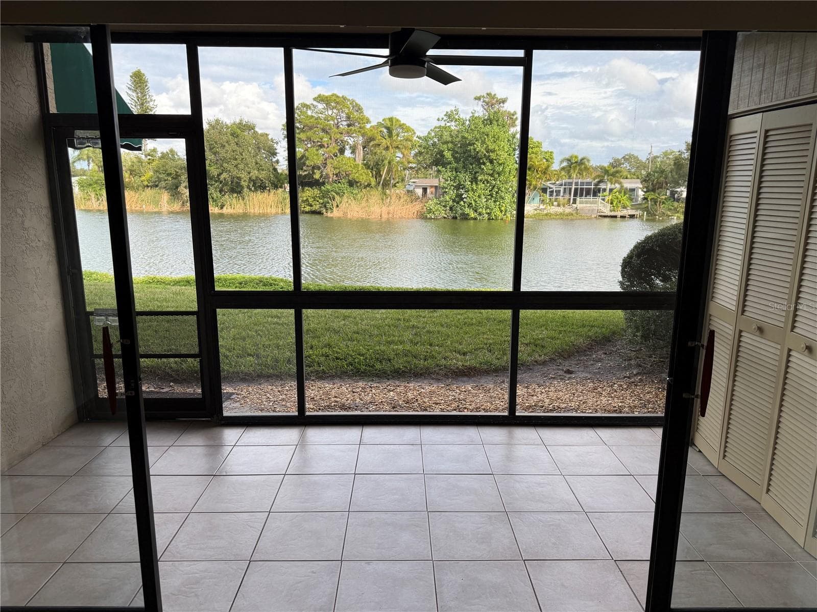 lanai view of Sunnyside lake - 5697 ASHTON LAKE DR #6, SARASOTA