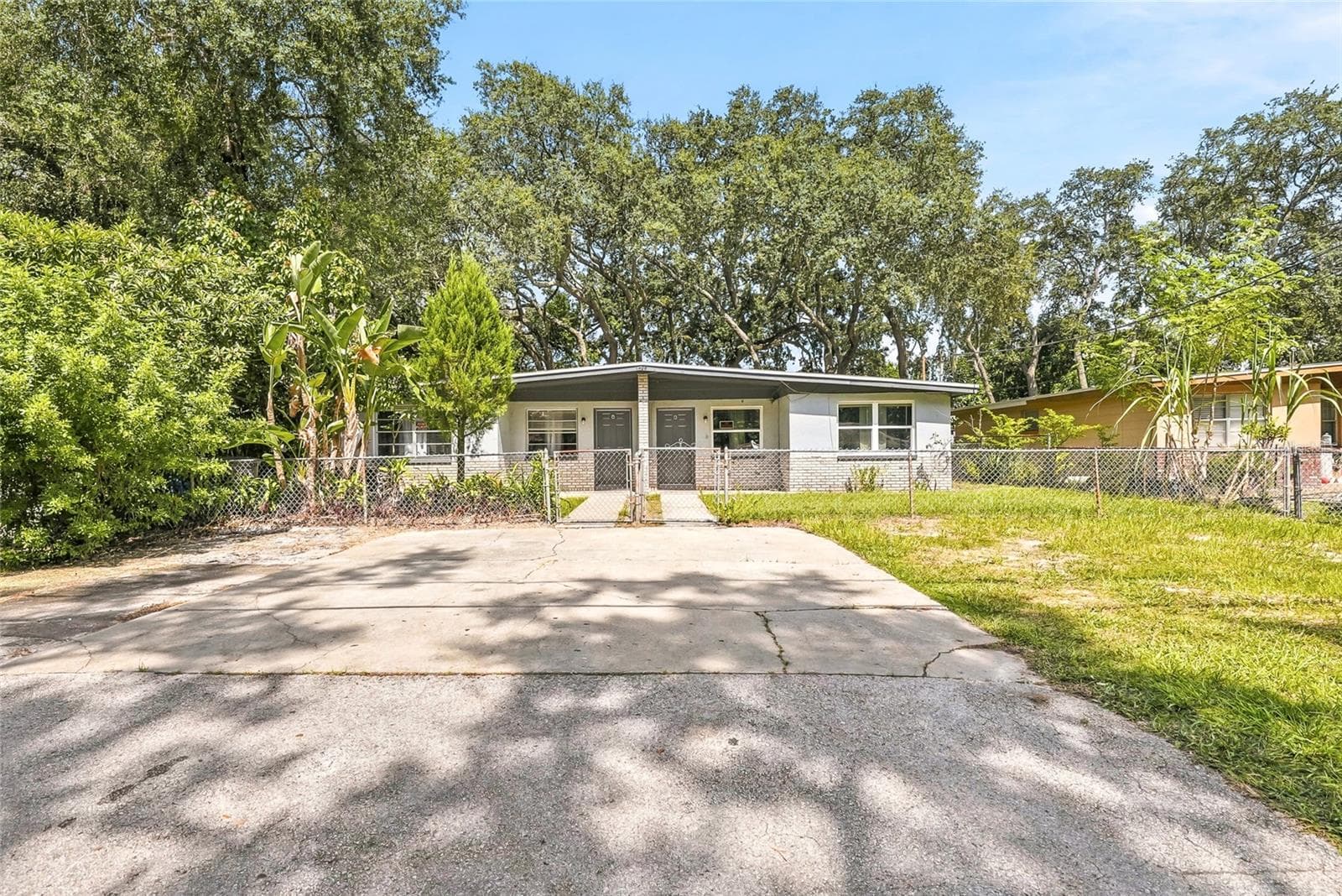 Duplex at 1408 E 140TH AVE, TAMPA, photo 3 of 55