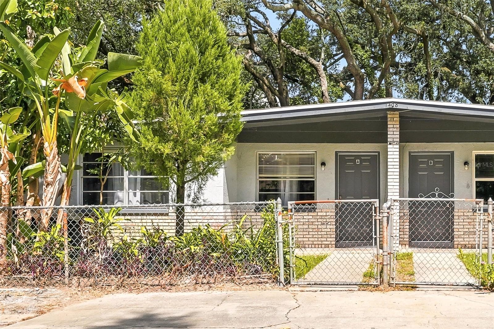 Duplex at 1408 E 140TH AVE, TAMPA, photo 5 of 55