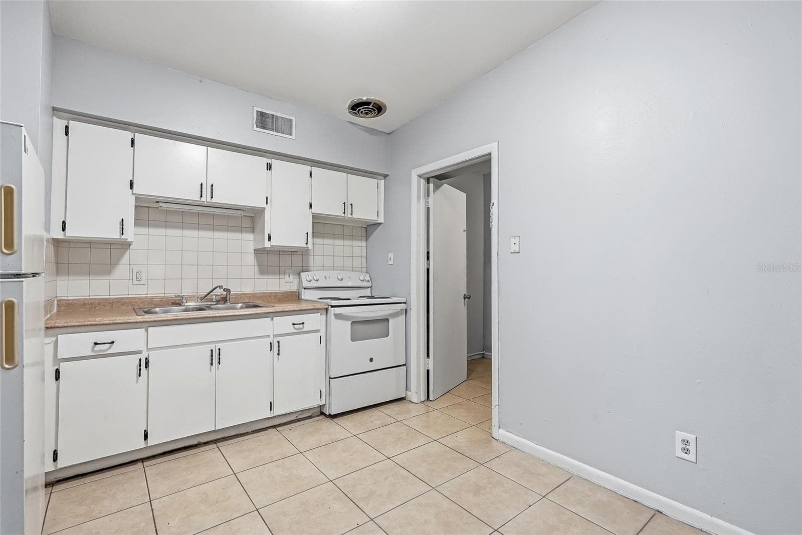 Duplex at 1408 E 140TH AVE, TAMPA, photo 12 of 55