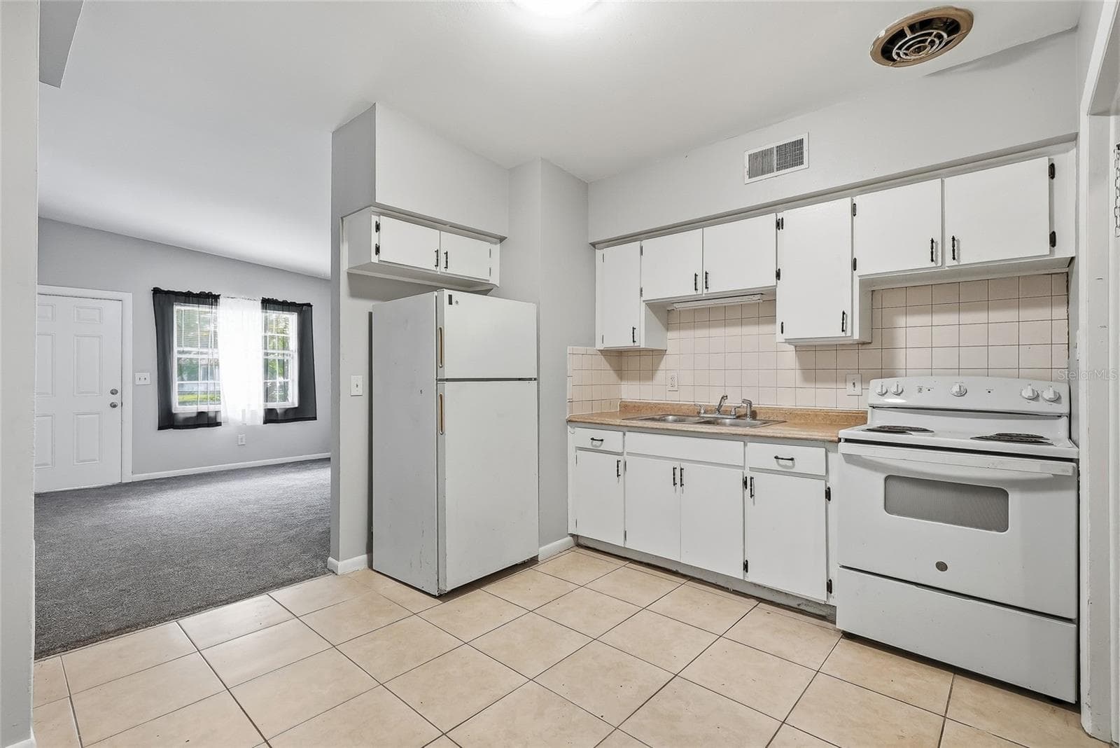 Duplex at 1408 E 140TH AVE, TAMPA, photo 13 of 55