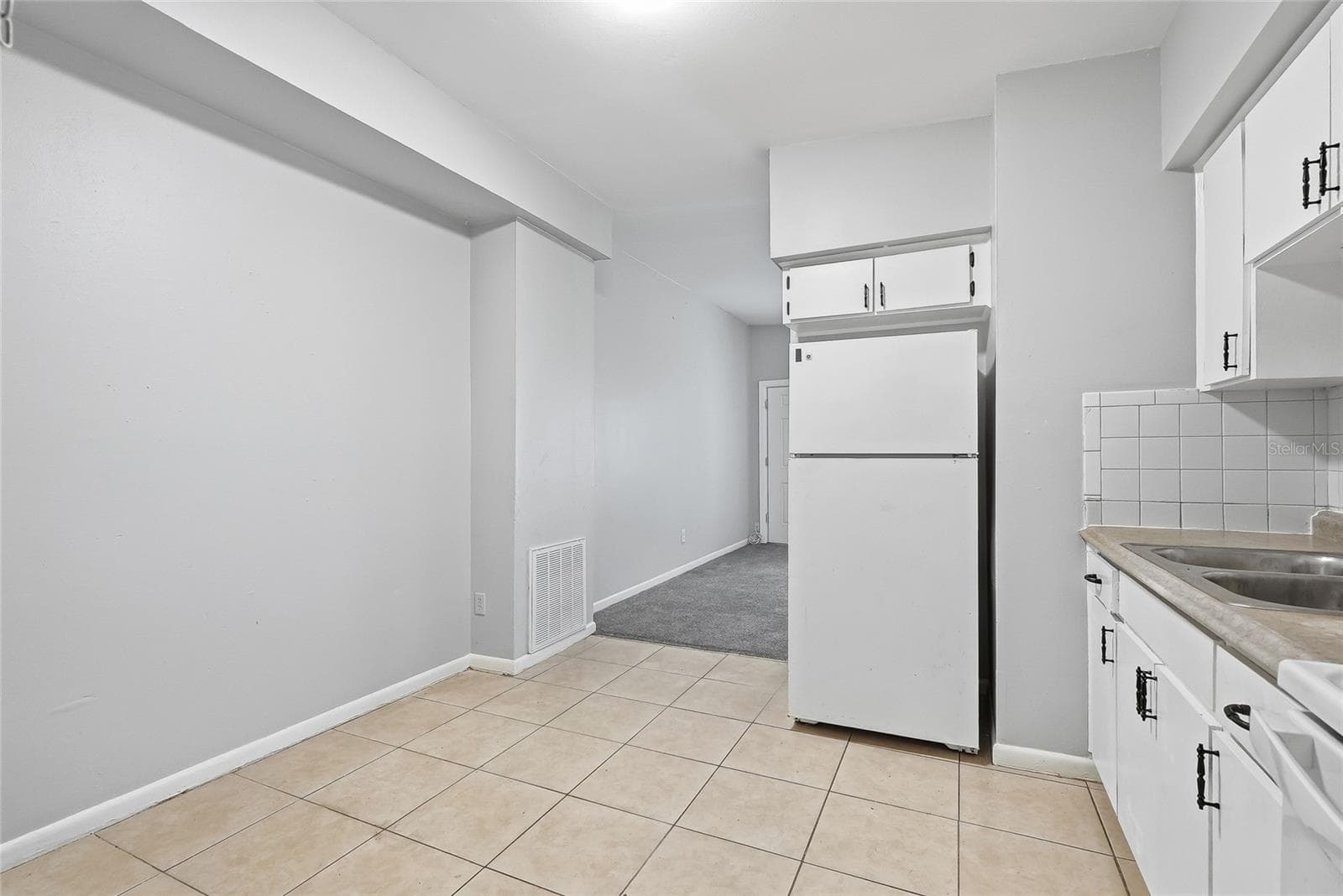 Duplex at 1408 E 140TH AVE, TAMPA, photo 16 of 55