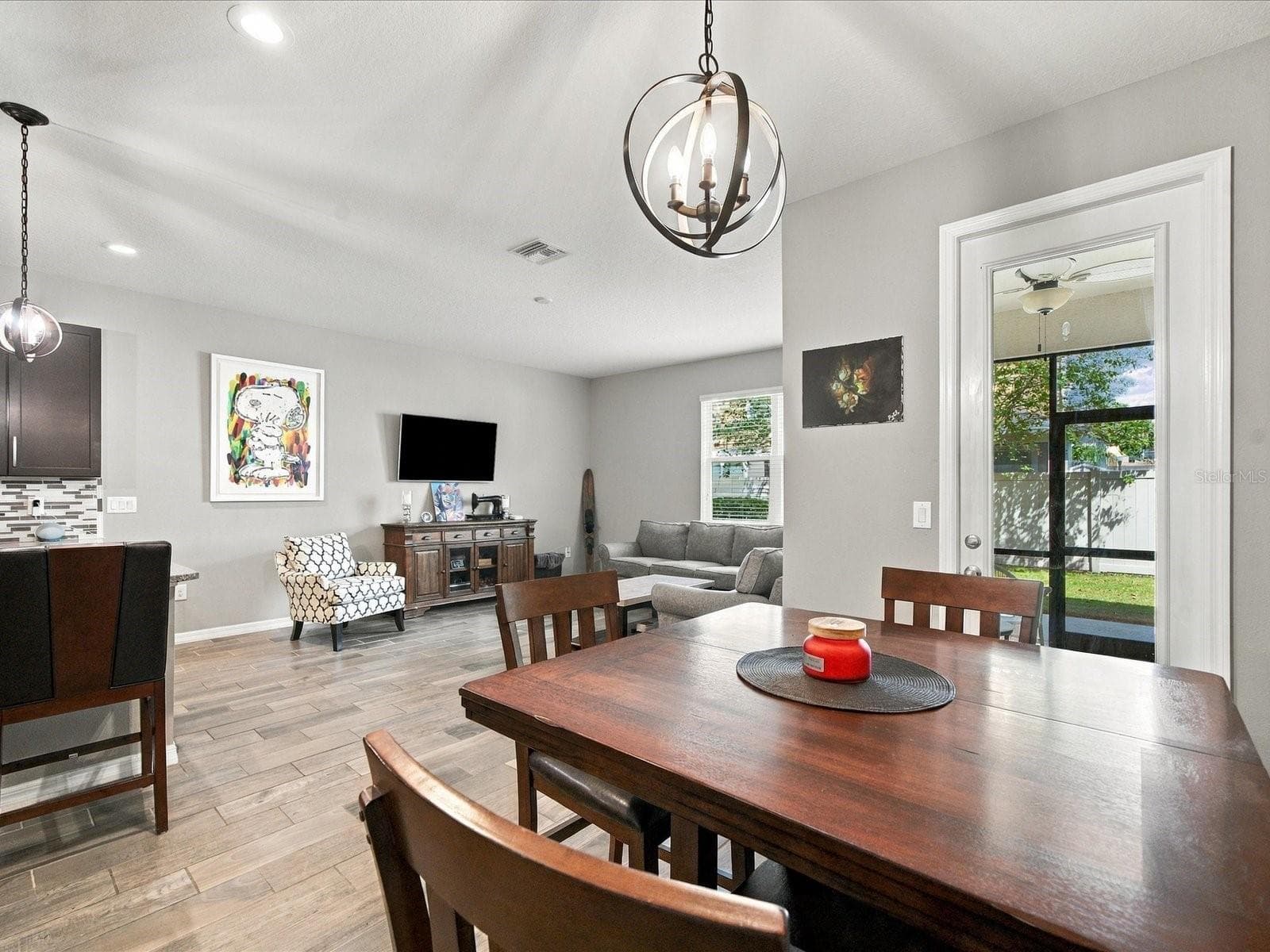 Dining room overlooking living room. - 18901 CORNUTA ST, LUTZ