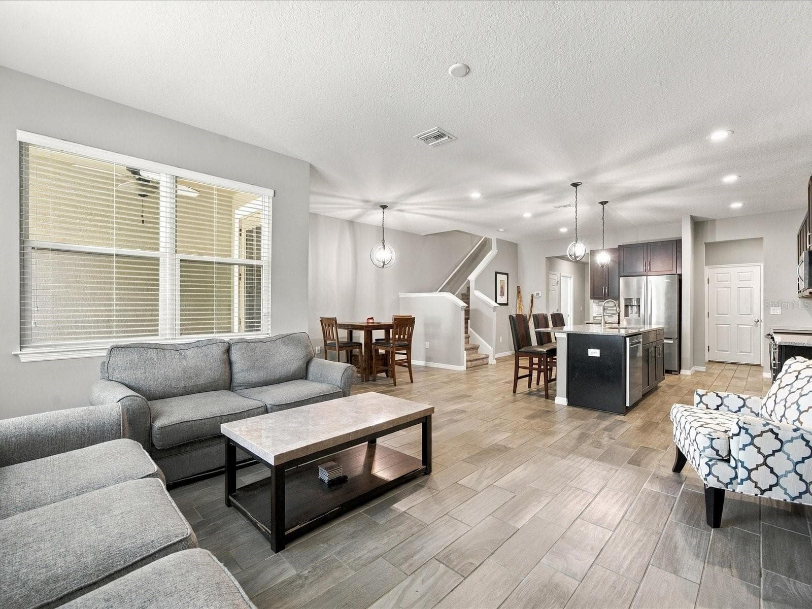 Living room/dining room/kitchen - 18901 CORNUTA ST, LUTZ