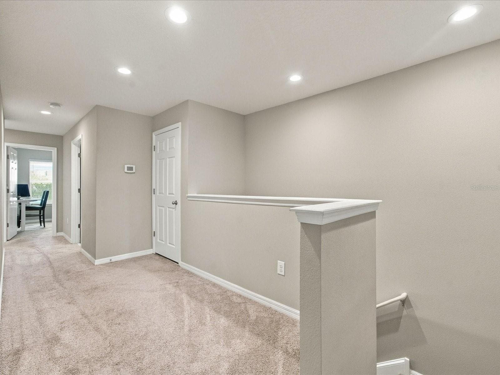 Upstairs hallway. - 18901 CORNUTA ST, LUTZ
