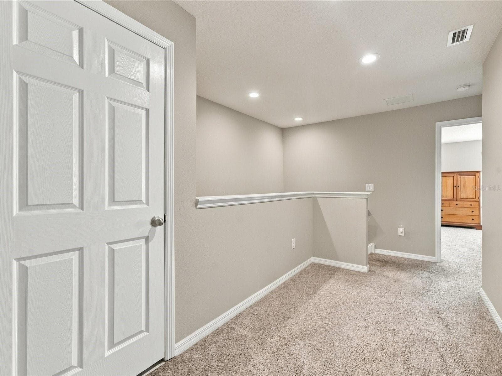 Upstairs hallway. - 18901 CORNUTA ST, LUTZ