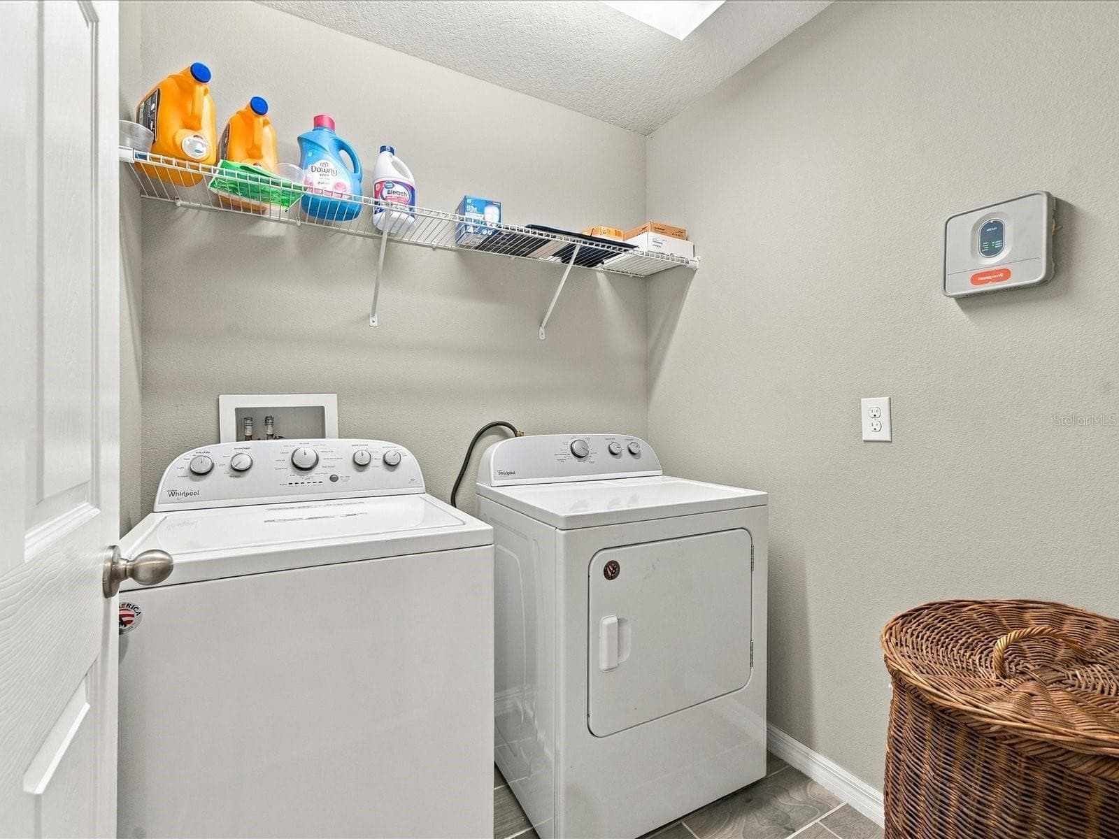 Laundry room (upstairs). - 18901 CORNUTA ST, LUTZ