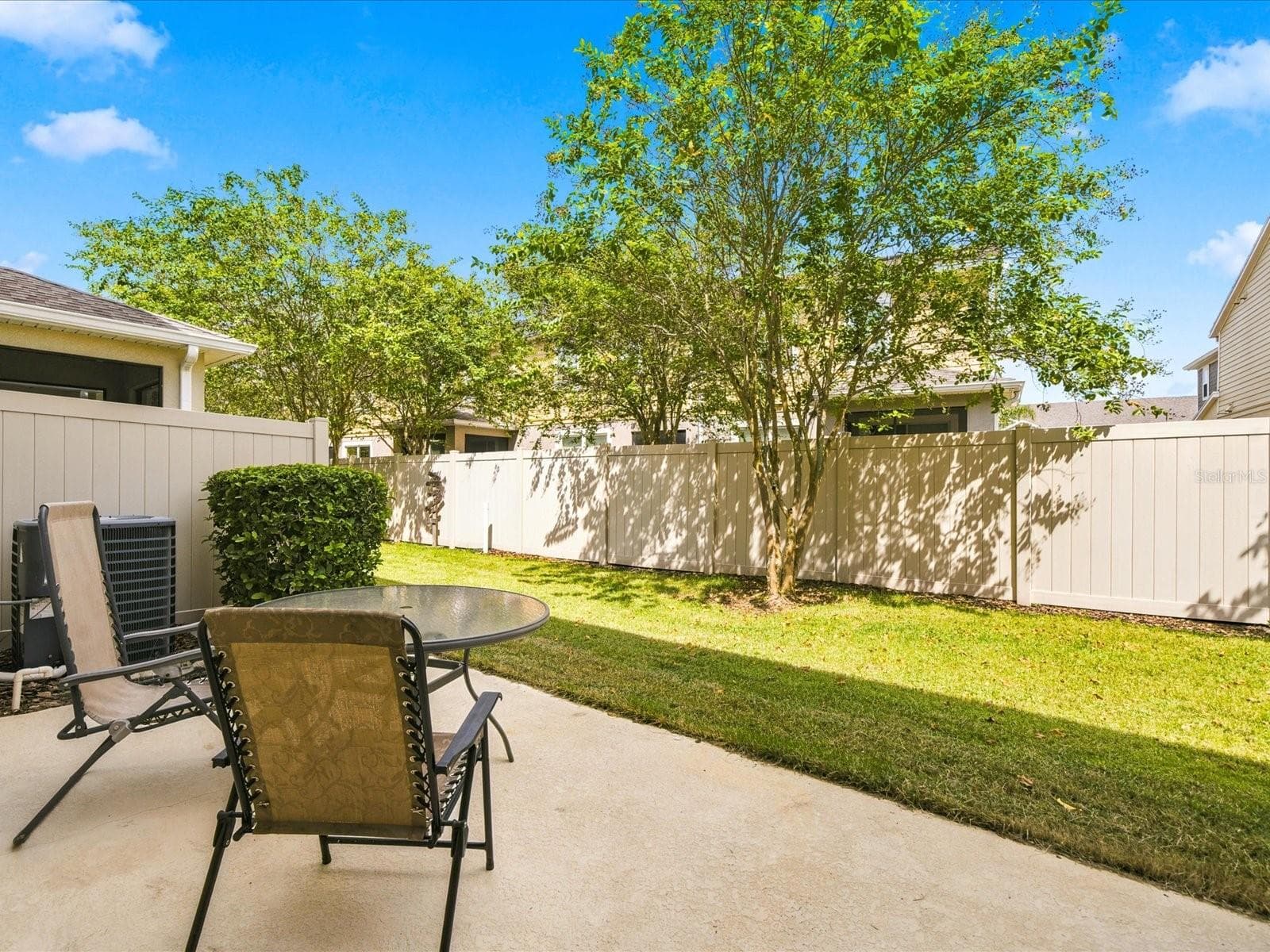 Extended back porch. - 18901 CORNUTA ST, LUTZ